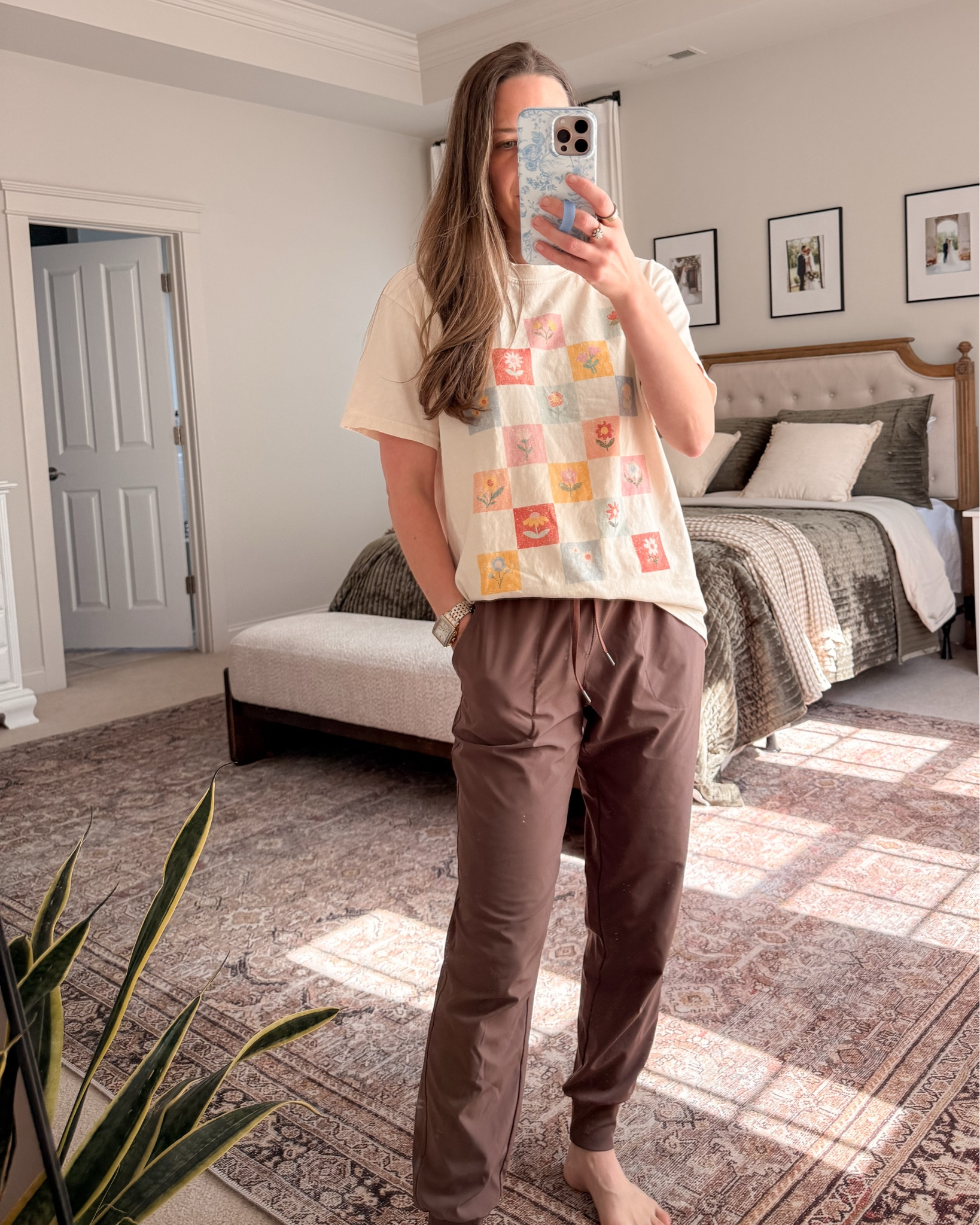 Casual Mom Outfit for Real Life 🤎

• @Mountain Moverz  graphic tee (so cute for spring)
• Amazon joggers

Some days are denim days.
Some days are jogger days.

This is one of my comfy but still put-together mom outfit formula: elevated graphic tee + neutral joggers.

The spring graphic adds personality without overwhelming the outfit, and the joggers keep it practical for busy mornings, errands, and everything in between.

Perfect for:
• Casual mom outfits
• Graphic tee outfit ideas
• Amazon joggers outfit
• Stay at home mom style
• Comfortable everyday outfits
• Spring mom style
• Relaxed capsule wardrobe

Easy. Comfortable. Still intentional.

#LTKmomlife #LTKootd #LTKgrwm