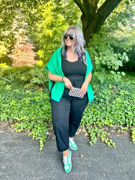  ✨SIZING•PRODUCT INFO✨
⏺ Black Parachute Jogger Pants with Drawstring Waist (high-waisted) - XXL - TTS leaning small @walmartfashion  
⏺ Black Fitted Scoop Neck Tank Top - wears like a bodysuit (but isn’t) - XL - runs small @walmartfashion   
⏺ Green & White Court Sneakers - run 1/2 size big @walmartfashion 
⏺ Green Sweatshirt - size up to be oversized to XXL (on clearance!) @walmartfashion 
⏺ Black & White Checkered Wristlet @walmart 
⏺ Black Shapermint Shaping Bodysuit - XL  @shapermint 
⏺ Favorite No Show Socks @amazon 
⏺ Large Oversized Black Retro Sunglasses @walmart 

Sporty outfit, athleisure outfit, weekend casual, running errands outfit, sneakers outfit, green outfit, preppy look, sweatshirt, joggers outfit, how to style parachute pants, cargo pants outfit, Black, drawstring, high-waisted pants, khaki, cargo pants, parachute pants, joggers, sporty, sport, athleisure, bodysuit, scoop neck, tank top, fitted, court sneakers, green sneakers, shaping cami, sweatshirt on shoulders, draped sweatshirt, hoodie, preppy look, wristlet, checkered, black and white, green, Kelly green, wallet, oversized sunglasses

#walmart #walmartfashion #walmartstyle walmart finds, walmart outfit, walmart look  #athletic #althleticwear #athleticoutfit #athleticstyle #athleticlook #athleticfashion #athleisure #athleisurewear #athleisureoutfit #athleisurelook #athleisurestyle #athleisurefashion #sport #sportyoutfit #sportoutfit #sportylook #sportlook #sportstyle #sportystyle #sportyfashion #sneakersfashion #sneakerfashion #sneakersoutfit #tennis #shoes #tennisshoes #sneakerslook #sneakeroutfit #sneakerlook #sneakerslook #sneakersstyle #sneakerstyle #sneaker #sneakers #outfit #inspo #sneakersinspo #sneakerinspo #sneakerinspiration #sneakersinspiration #under10 #under20 #under30 #under40 #under50 #under60 #under75 #under100
#affordable #budget #inexpensive #size14 #size16 #size12 #medium #large #extralarge #xl #curvy #midsize #pear #pearshape #pearshaped
budget fashion, affordable fashion, budget style, affordable style, curvy style, curvy fashion, midsize style, midsize fashion

#LTKMidsize #LTKStyleTip #LTKFindsUnder50