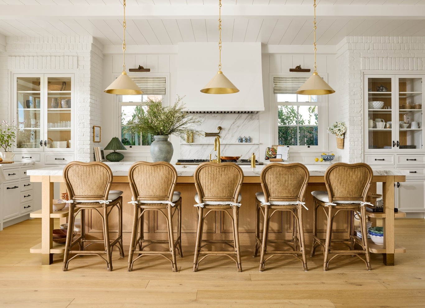Kitchen design with woven counter stools, bamboo shades, pendant lighting, and beautiful white cabinets. This is always a classic look! 🙌🏻

#LTKHome