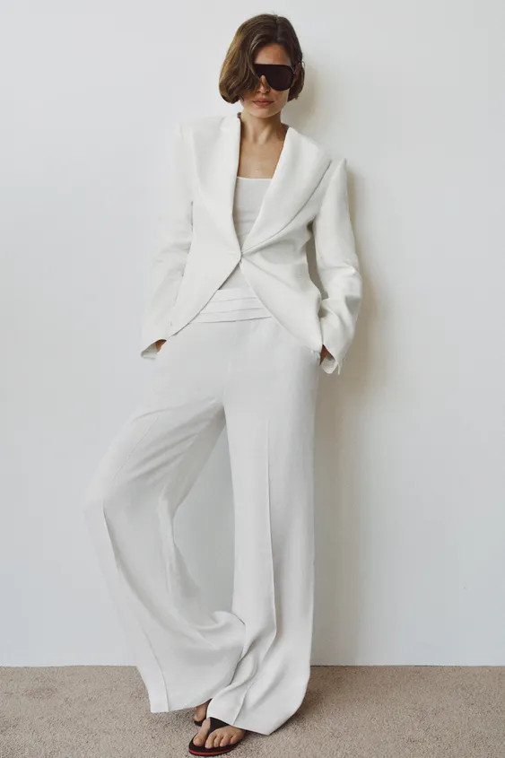 ZARA WOMAN COLLECTIONBlazer made with 32% linen yarn. Tuxedo collar and long sleeves with button.... | Zara US