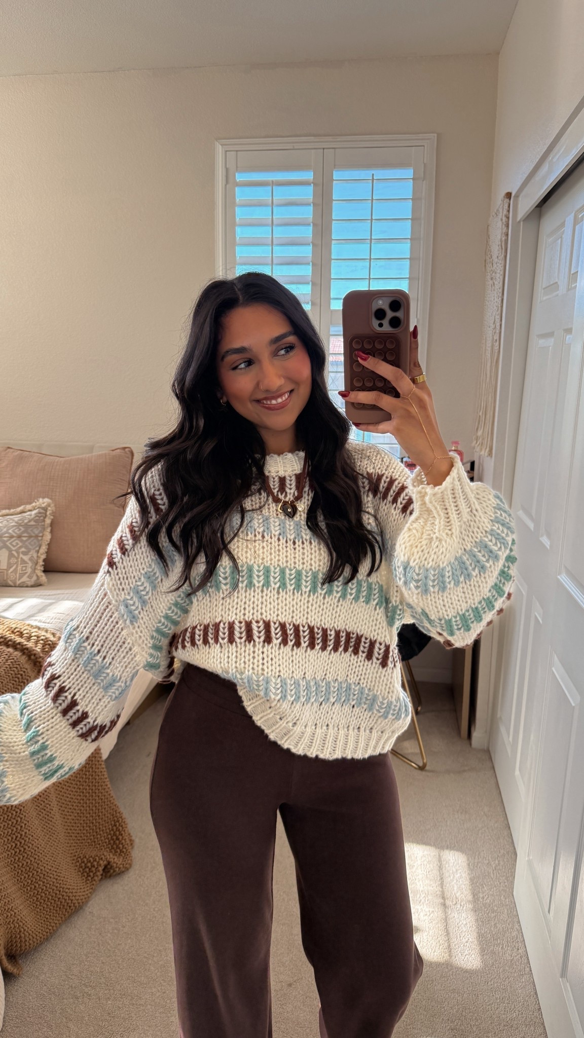 Love this sweater so much 🫶🏽🤎