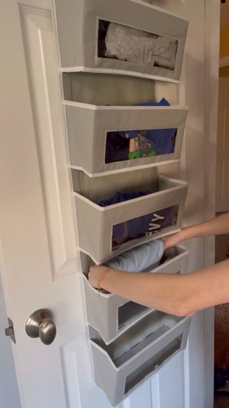 Hanging closet organizer - perfect for organizing clothes for days of the week, baby items like diapers and toys, and more. Under $20 and very durable. I have the Gray color - more color choices available. 

Amazon home. Home organizing ideas. Organization. Organizing. Kids closets. 

#LTKkids #LTKfamily #LTKunder50