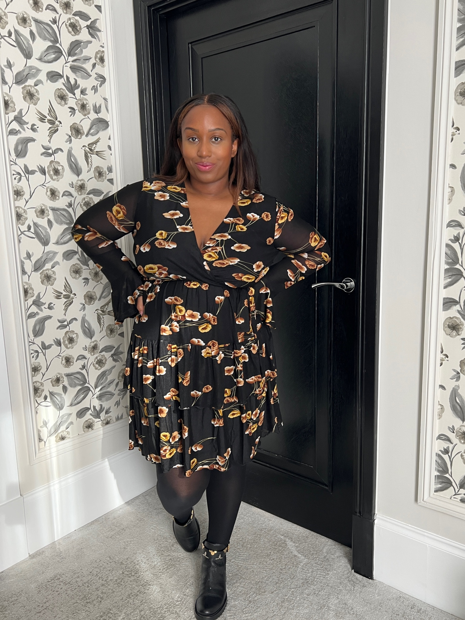 Black floral skater dress, thick black tights and black bikers boots 

#LTKshoecrush #LTKeurope #LTKcurves