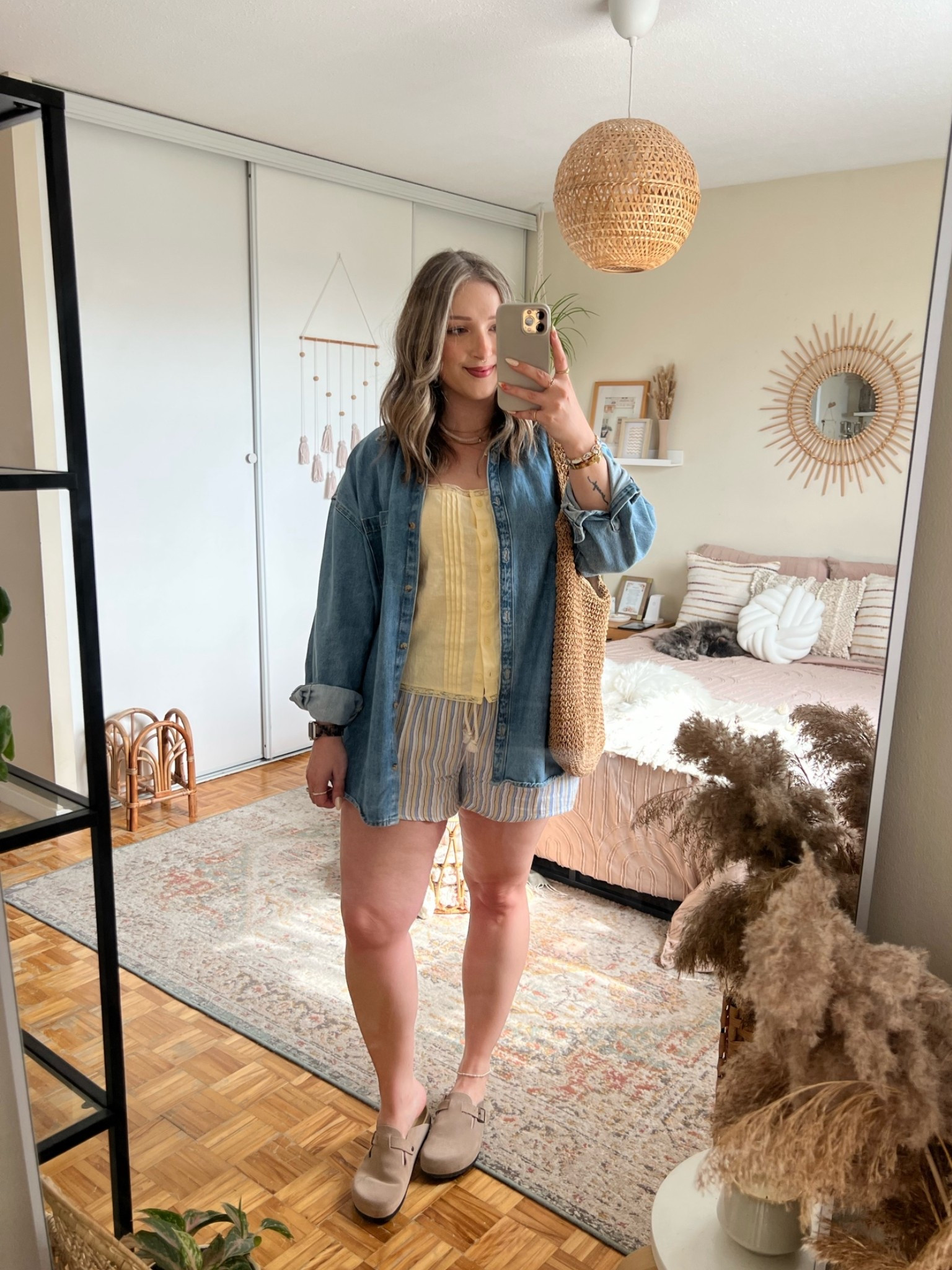 Easy summer outfit! Canadian links are under “similar products”. Wearing my usual size L in the striped shorts, butter yellow tank top, and oversized denim shirt. Straw tote bag is one of my fave Amazon finds! Linked similar clogs

#LTKsummer #LTKsale #LTKmidsize