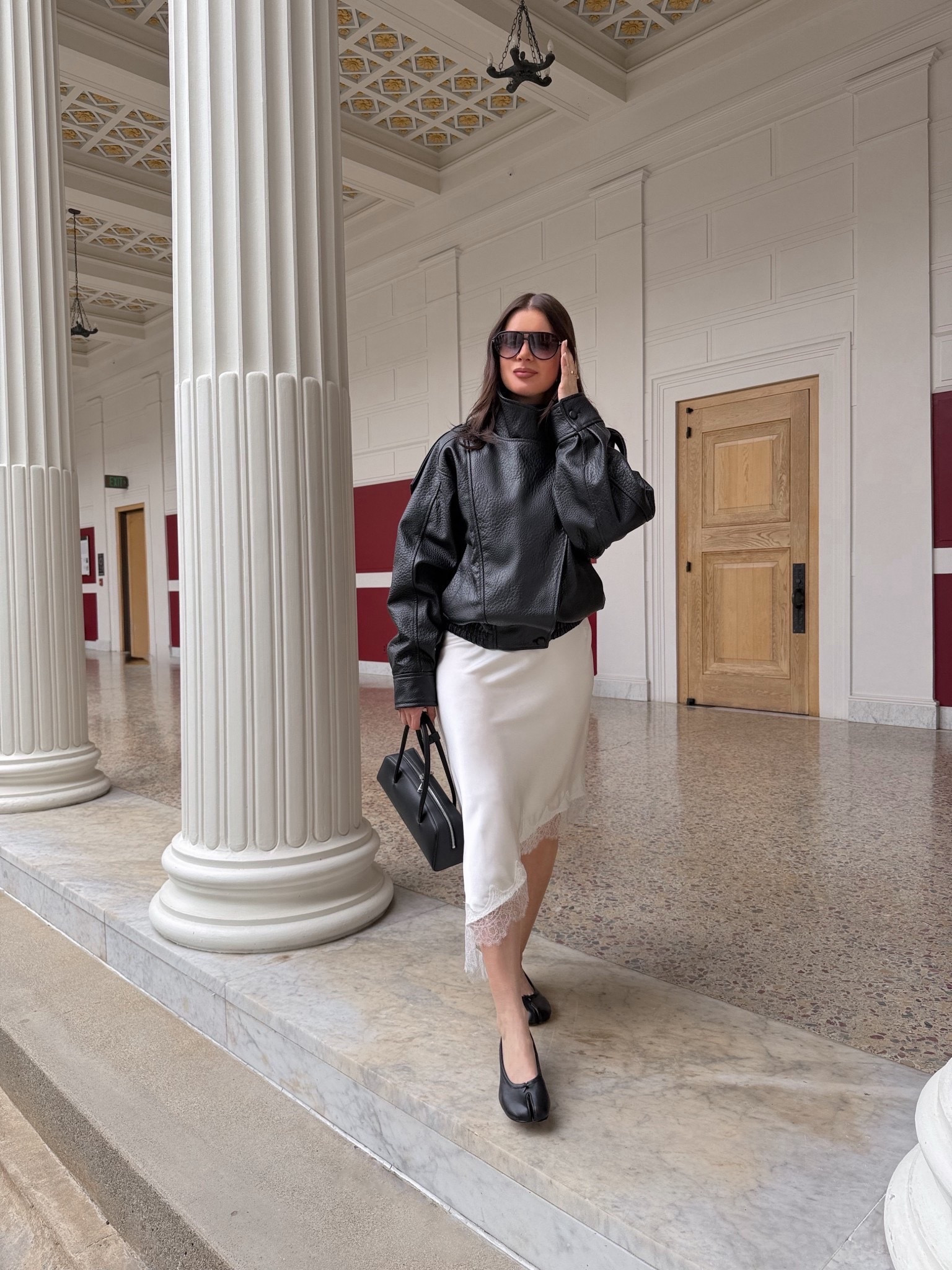 Styling @Zara black leather funnel neck jacket with @Zara satin lace trim skirt, @Steve Madden US split toe flats, Freya black leather shoulder bag and aviator sunglasses. 

#outfit #outfitideas #springoutfit #jacket #leatherjacket #flats #lacetrim #skirt #satin #silk #funnelneck #splittoe

#LTKSeasonal #LTKootd #LTKWorkwear