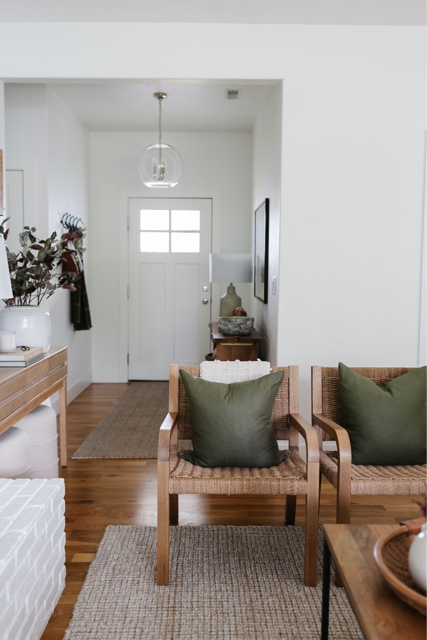 Fall decor, green pillows, Pottery Barn wool jute rug, living room decor, home decor, fall stems. 

#LTKsalealert #LTKhome #LTKSeasonal