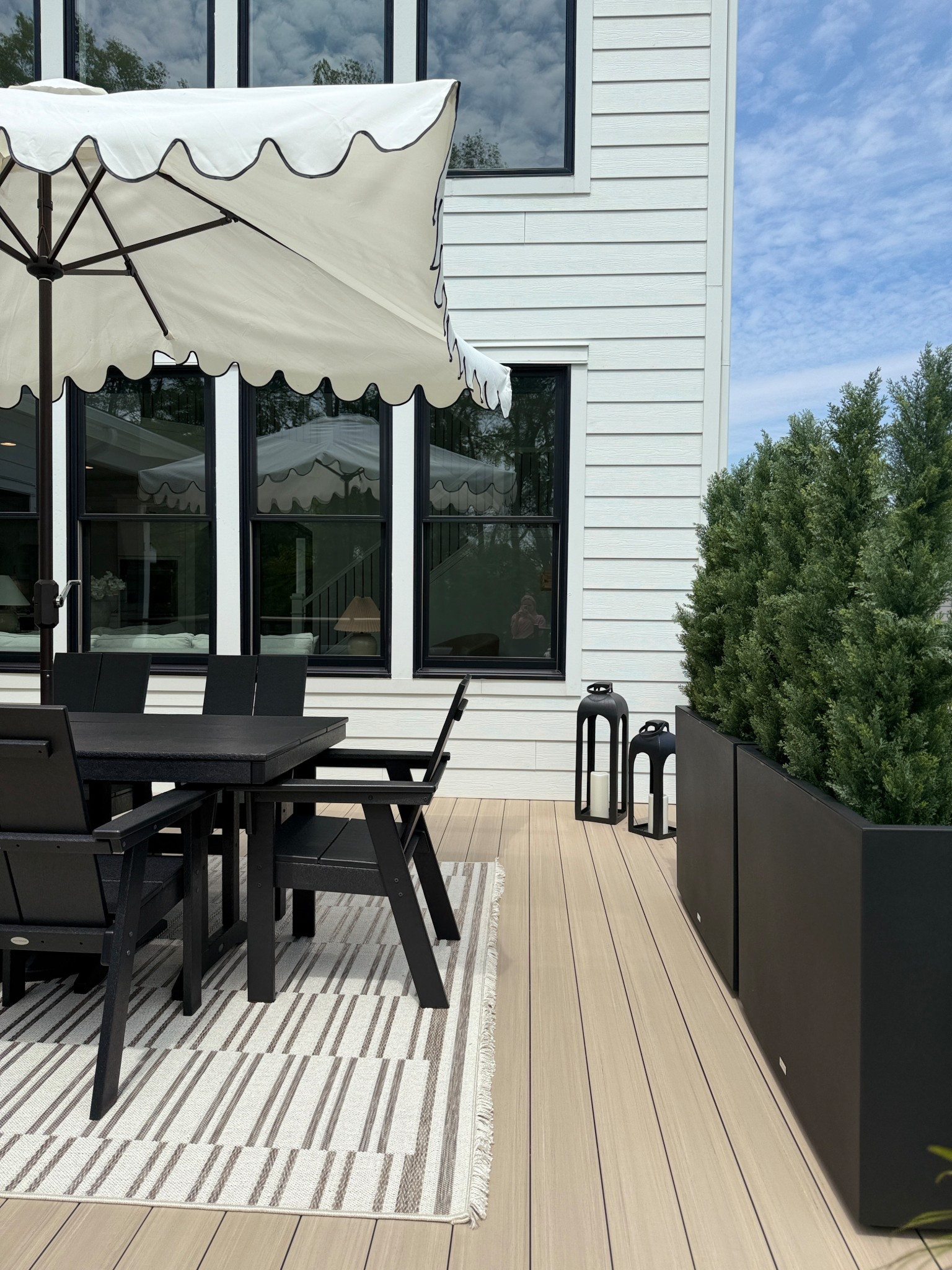 deck refresh 🖤 love how this space came together with our new outdoor rug and privacy screening! 

#LTKHome #LTKFindsUnder100 #LTKSeasonal