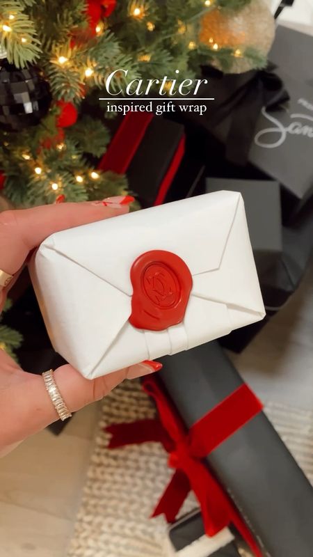Cartier inspired gift wrap tutorial! See my storefront for more gift wrapping ideas! #meandmrjones 

#LTKCyberWeek #LTKHoliday #LTKfindsunder50