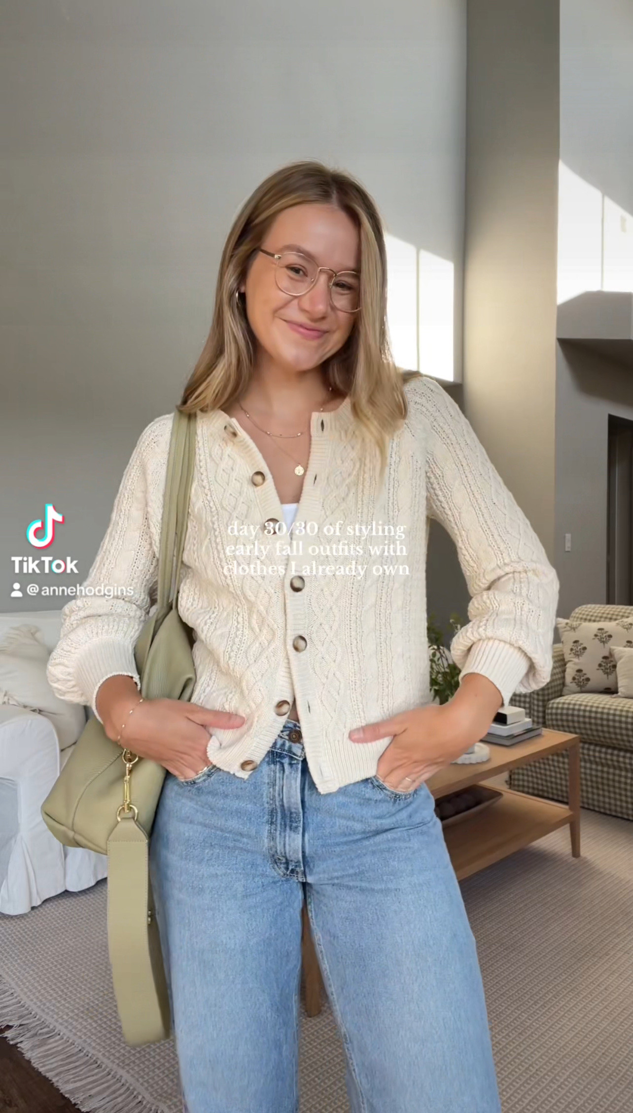 Cardigan is old sezane but linked similar, wearing medium. Jeans are Levi’s dad jeans wearing tts 27. Bag is cuyana. Shoes are Franco Sarto. Glasses are Eyebuydirect
