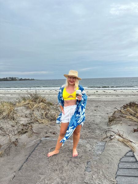 Bikini season is here and nothing is better then this yellow bikini. I love the cut out detail. I an wearing a medium in both top and bottom. I love it styled with this blue duster and paperbag shorts. 

#LTKSwim #LTKFindsUnder100 #LTKStyleTip