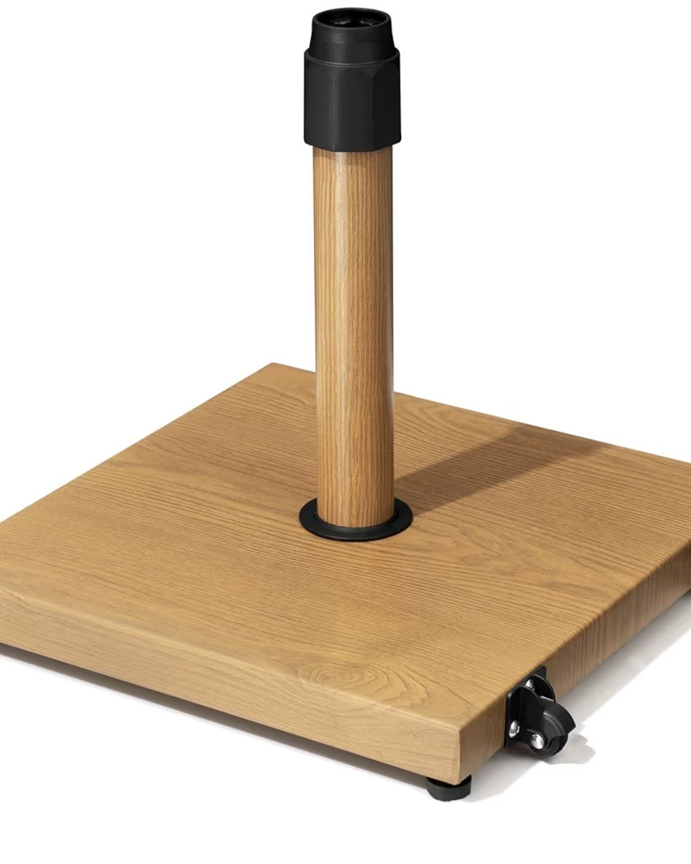 Teak umbrella stands on wheels. Convenient and will blend right in

#LTKSeasonal #LTKHome #LTKSwim
