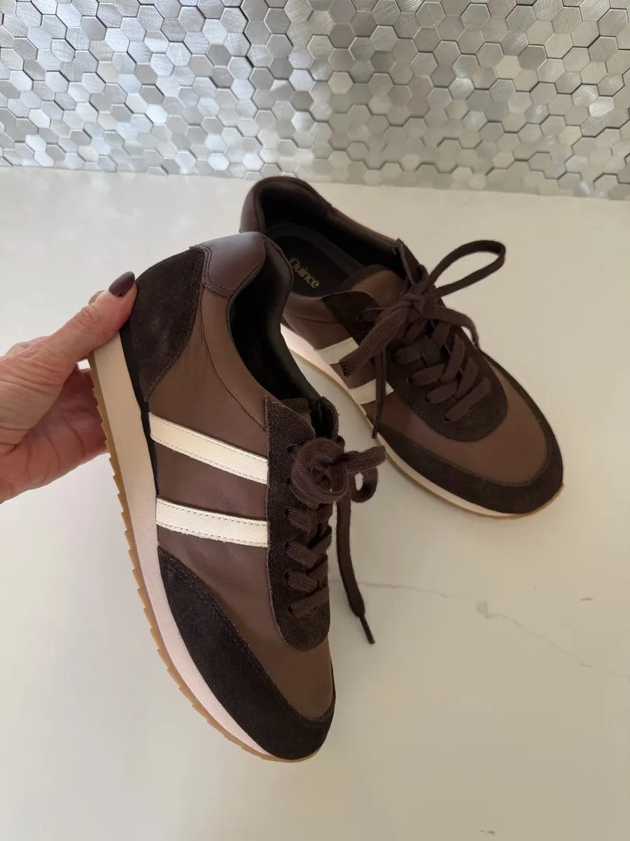 These Quince sneakers are such a chic find! I love the rich chocolate-brown mix of suede and smooth leather, plus the cream stripes give them a sporty vintage feel. They’ll look so cute with jeans, trousers, or a casual fall outfit.#Quince #QuinceSneakers #BrownSneakers #FallShoes #CasualChic #FallStyle #WomenOver40Style #LTKshoecrush 

#LTKOver40#LTKSeasonal#LTKOver40 

 

#LTKootd