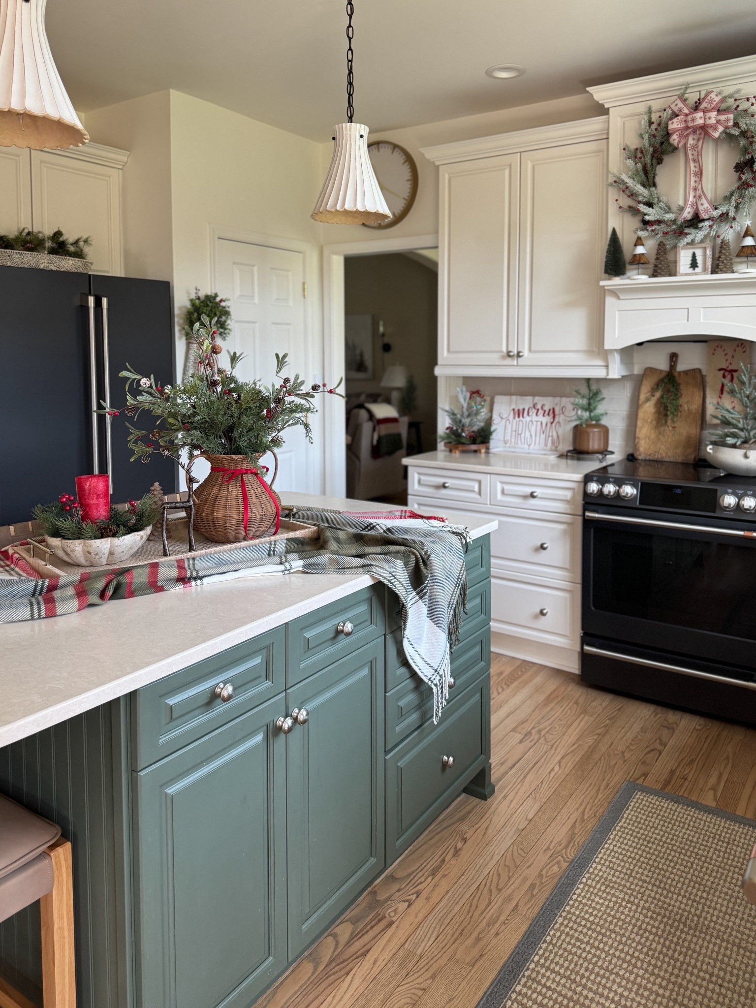 Christmas tray display. Christmas decor. Pendant lighting, vintage bread board and more  

#LTKSeasonal #LTKHome #LTKHoliday