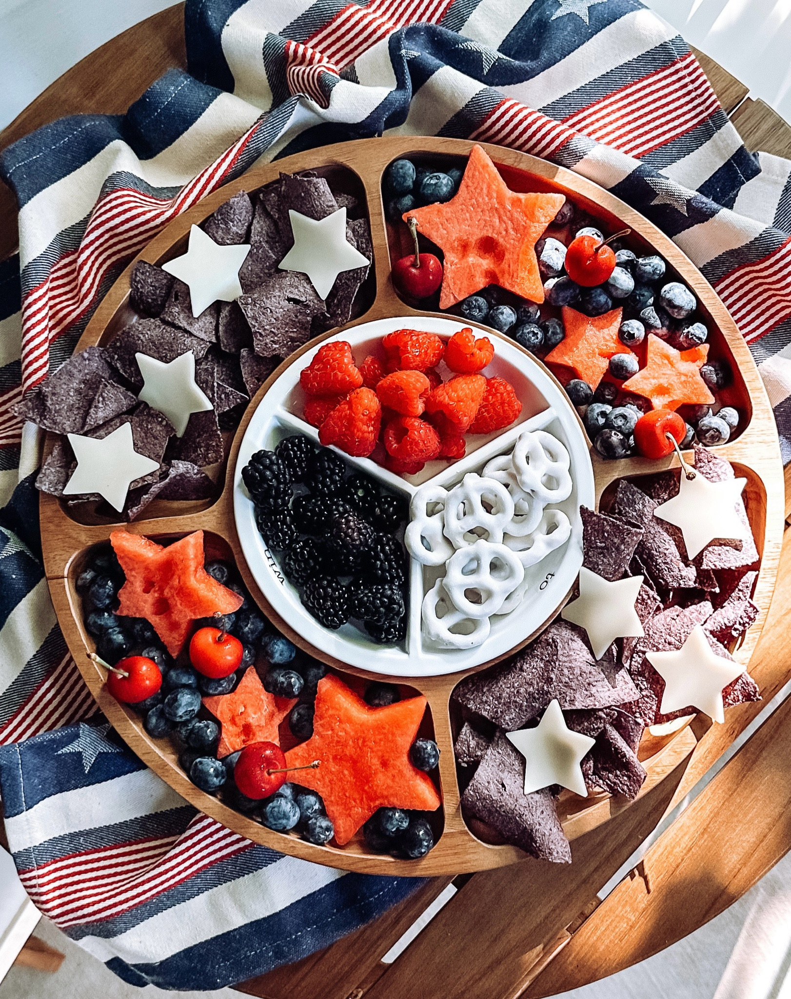 Inspiration to make a beautiful platter to snack on this Fourth of July! 🇺🇸
I used the  star cookie cutters for the watermelon and cheese… so fun!!!
And love this dish towel to display for the month of July! 

#LTKParties #LTKHome #LTKSeasonal