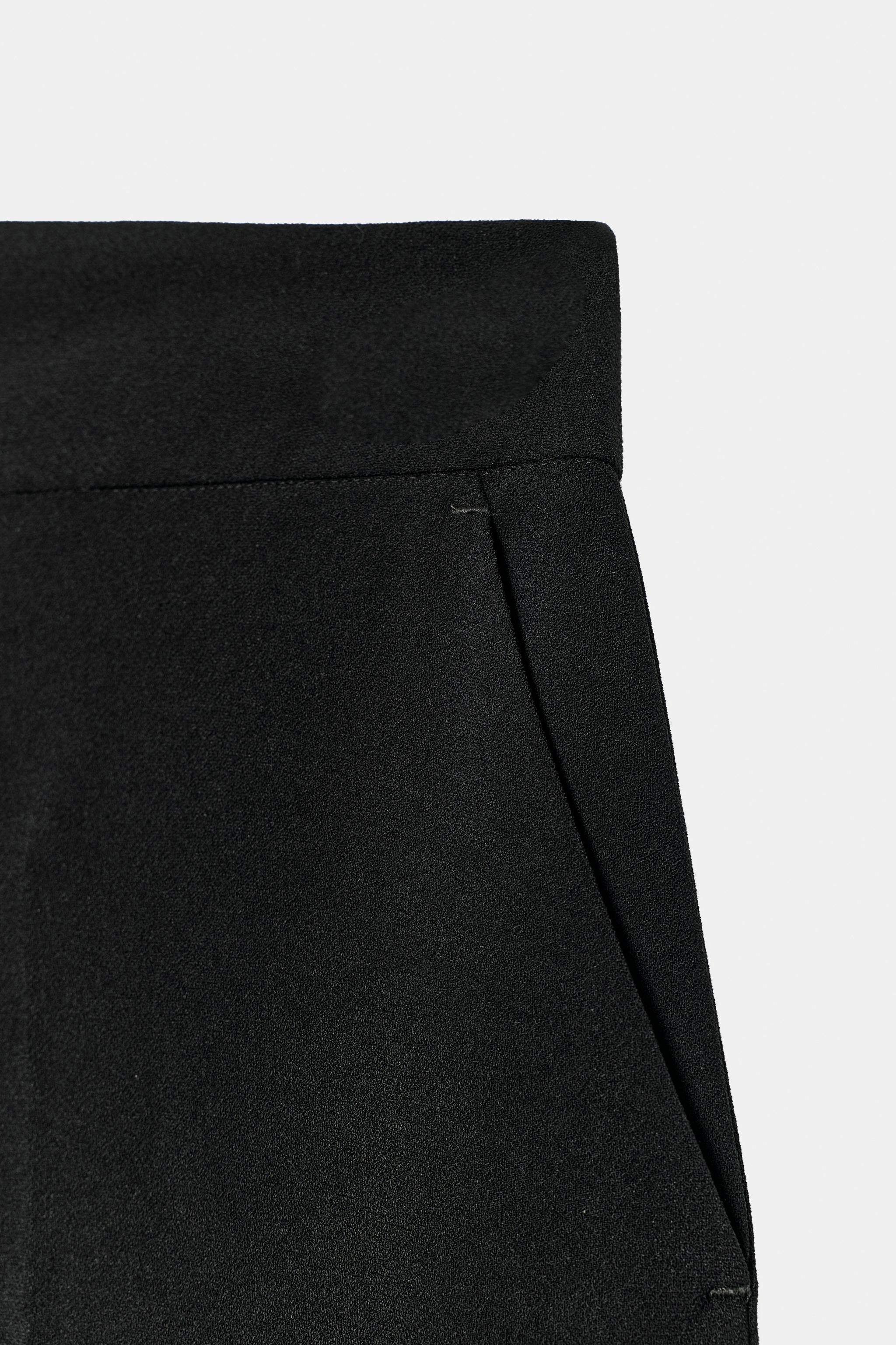High-waisted trousers with front pockets and back welt faux pockets. Wide leg. Front zip fly, int... | Zara US