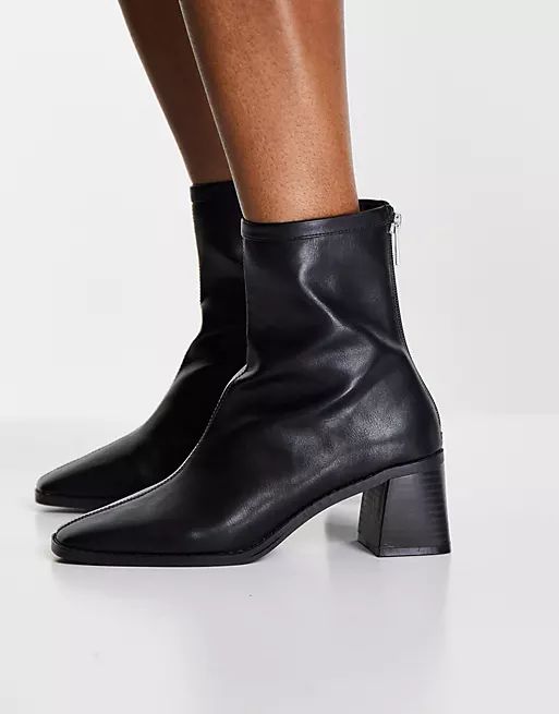 ASOS DESIGN Raider mid-heel ankle boots in black | ASOS (Global)