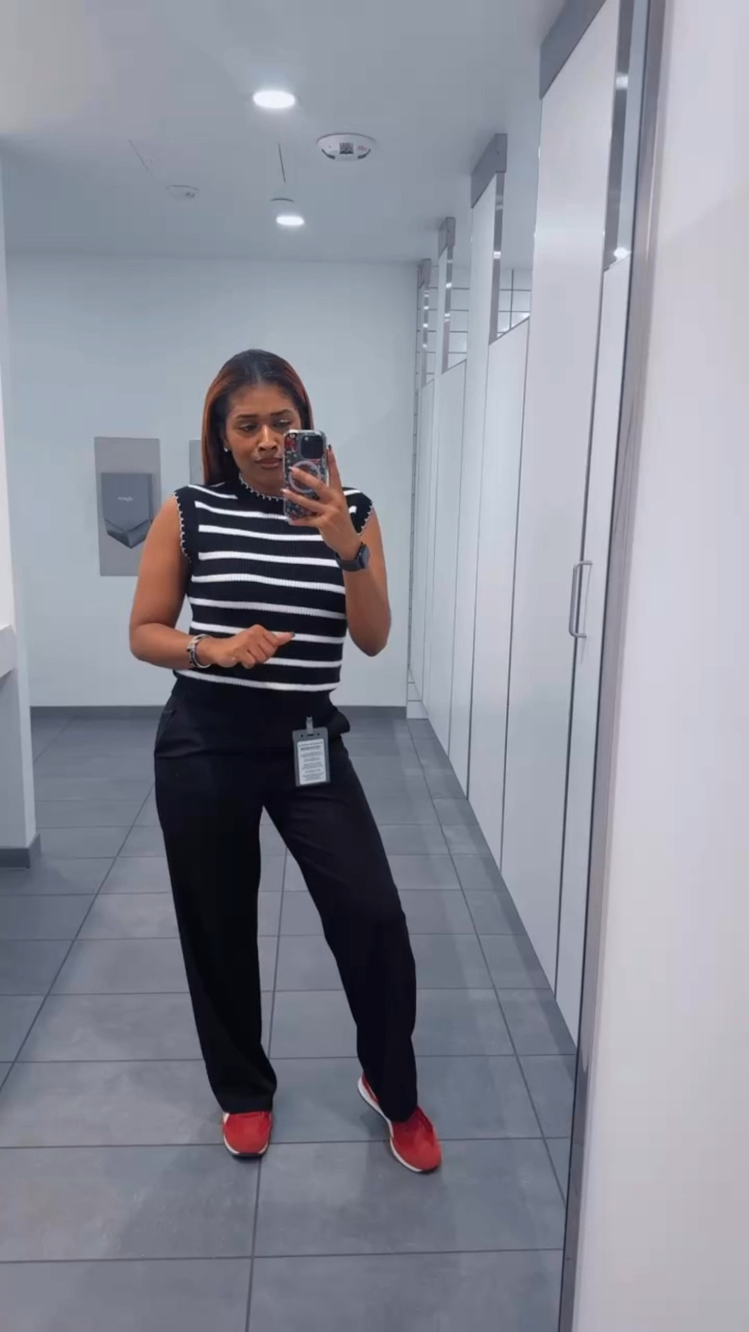 I know it’s been a minute, but I’m back with my work fit check! Chilly morning, warm afternoon so I had to find the perfect in-between for today’s look. This striped sleeveless crew neck sweater was a TJMaxx find (aka impossible to link), but don’t worry—I found a super similar option on Amazon! Paired it with classic black pants and my red Reebok Classic AZ sneakers for a little pop. 
#MondayFitCheck #LTKWorkwear #EffortlessStyle

#LTKWorkwear #LTKSeasonal #LTKFindsUnder100