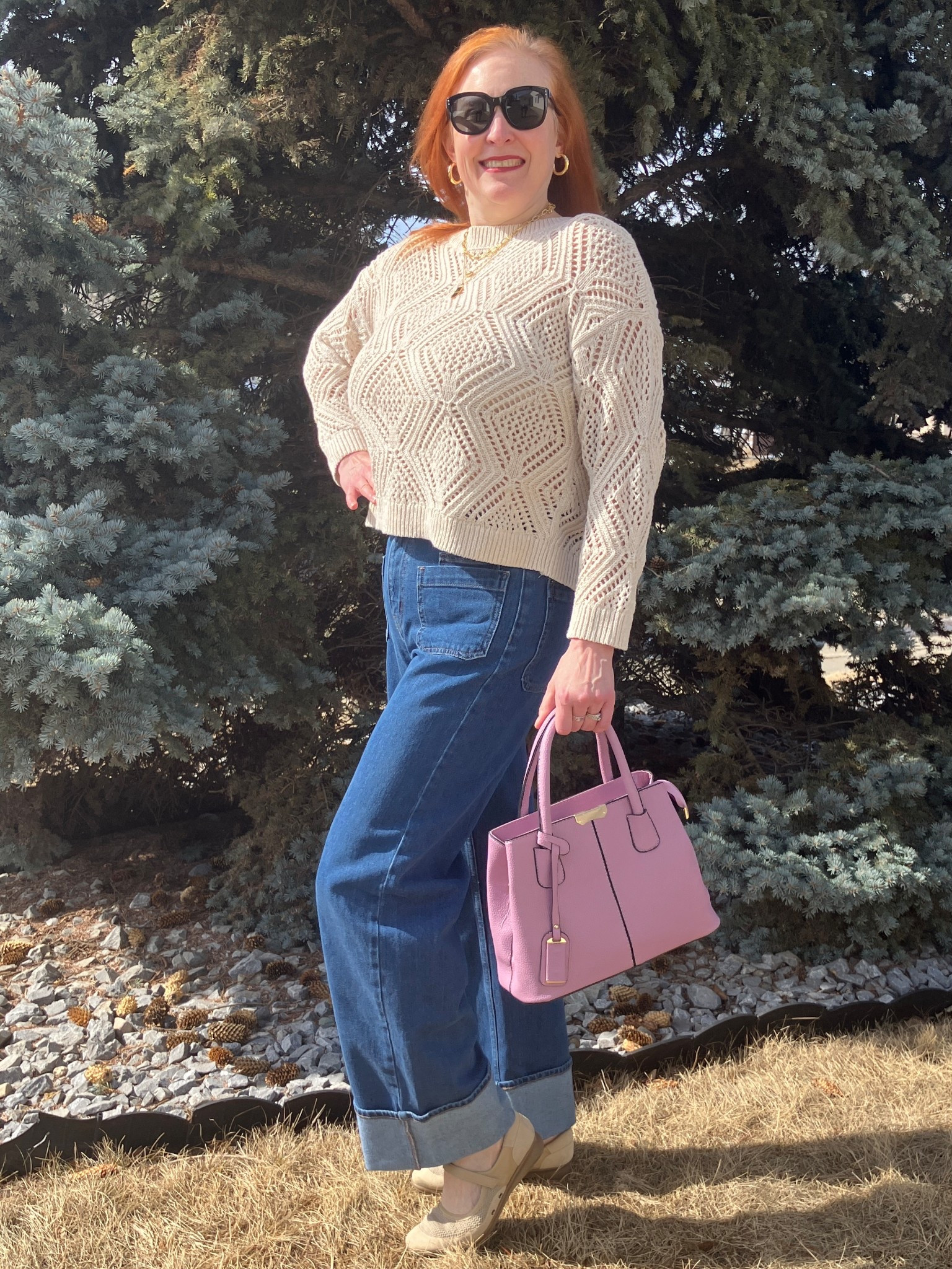 Maybe I do make my blue jeans talk! If they talked I’d bet they’d say, “Hey I’m so in style but husbands may not like me but that’s okay!” Loving the open knit trend so I was happy when I moved some sweaters around in my closet I found this sweater. I decided to pair it with matching shoes and added a nice pop of lavender with my bag. Still supposed to get snow Wednesday so I hope it melts right away. 😫 Canadians click on the first links to shop, and Americans click on the second links to shop. If there’s only one link then you can shop it in your own country. And remember, trendy doesn’t have to be expensive! Bye!

#LTKmomlife #LTKOver40 #LTKootd