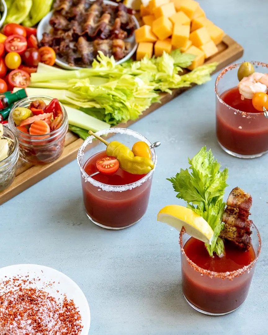 In my opinion, you can’t have boozy brunch without a good Bloody Mary. Mimosas are great too, but who doesn’t love a drink that basically comes with an entire appetizer as a garnish? Next time you have a brunch bash or a fun luncheon, set up this BYO bloody mary bar–go wild and see just how much your guests can load up on their cocktail sticks. And who can resist teeny tiny bottles of Tabasco? They also make great little party favors. Pro tip: Use metal cocktail sticks skewers so folks can really load up on goodies–they’re a lot sturdier than the wooden ones.

#LTKSeasonal #LTKfoodie