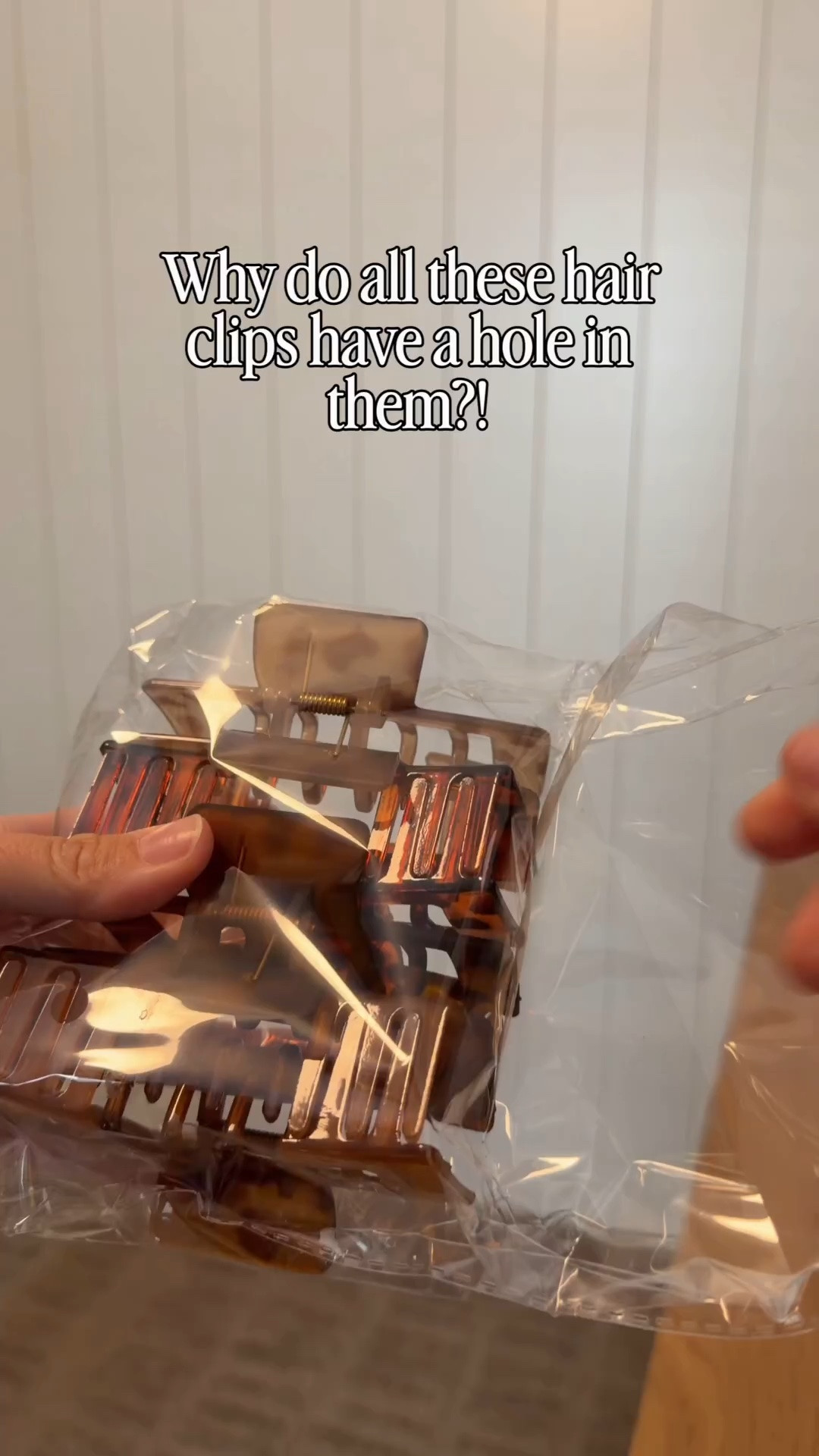If you've ever tried to wear a regular claw clip under a hat, you know it pokes into the back and the whole thing sits weird. These have an open design so the strap of your cap slides right through, and your hair stays up all day.

They hold thick hair, they come in a 4-pack, and the tortoise shades look cute even when you're not wearing a hat. They're under $8 for all four in the US right now.