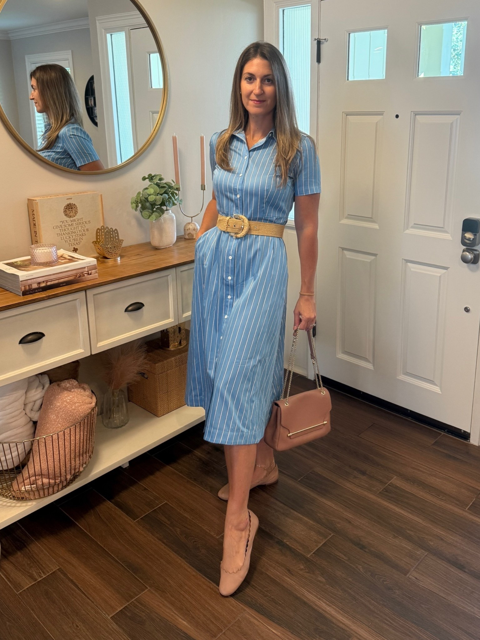 This blue/white striped midi dress is an easy go to. What I love about it: it has a collar, short sleeves and pockets! Plus, it’s soft and comfortable! On mega sale now - 50% off + an extra 40% off! Perfect for work or an elevated off duty look. 

Style tip: pair it with a raffia belt!

Dress runs TTS. Wearing a size 4.

#LTKWorkwear #LTKOver40 #LTKSaleAlert