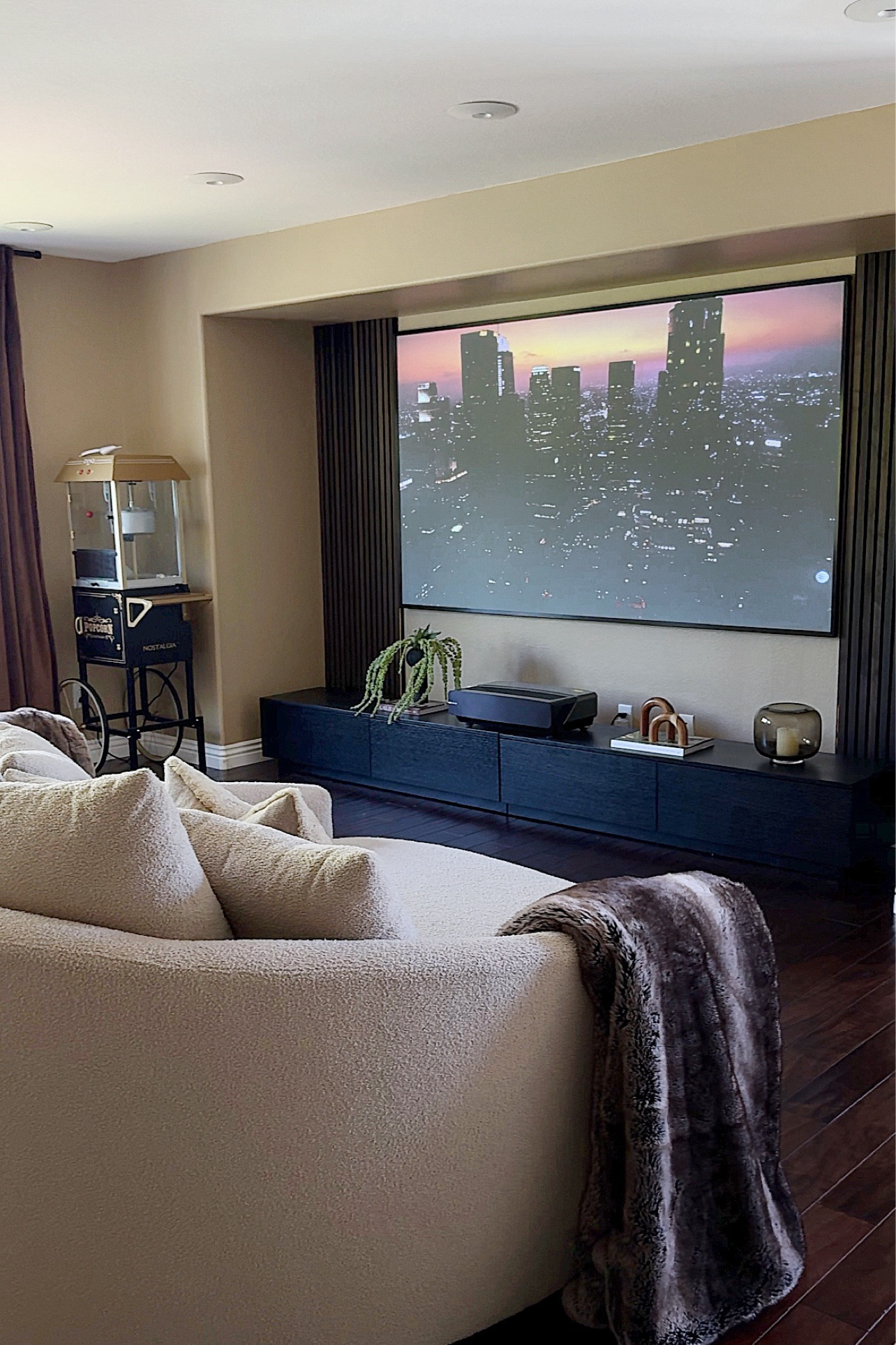 Went with warmer tones in this room to bring in a warm and cozy feel to the space. Grab some popcorn and put your feet up! 🎥🍿


#movieroom #movieroomdecor #movieroomdesign #hometheaters #hometheatredesign #tvwall #tvwalldesign #tvwalldecor 

#LTKHome