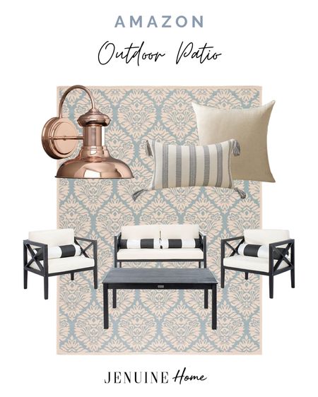 Outdoor patio. Blue and neutral outdoor rugs. Black and white sofa outdoor. Grey and white striped outdoor pillow. Neutral outdoor pillow. Rose gold outdoor light. Outdoor couch set.  