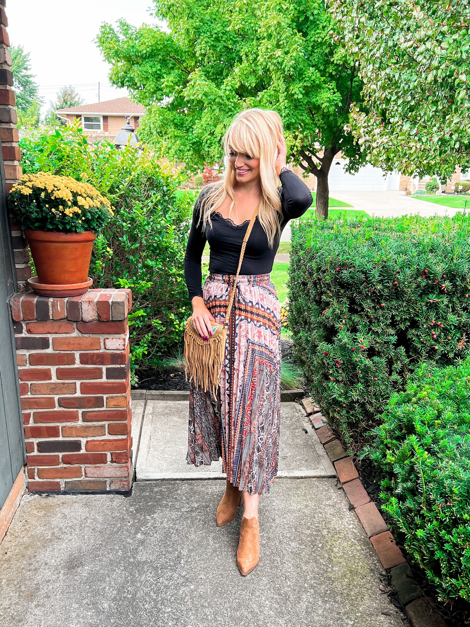 I just love this boho maxi skirt! The muted tones reflect fall, but it’s so versatile for all year! - boho bag - long sleeve black T-shirt - boho style - Amazon Fashion 

#LTKitbag #LTKunder50 #LTKSeasonal