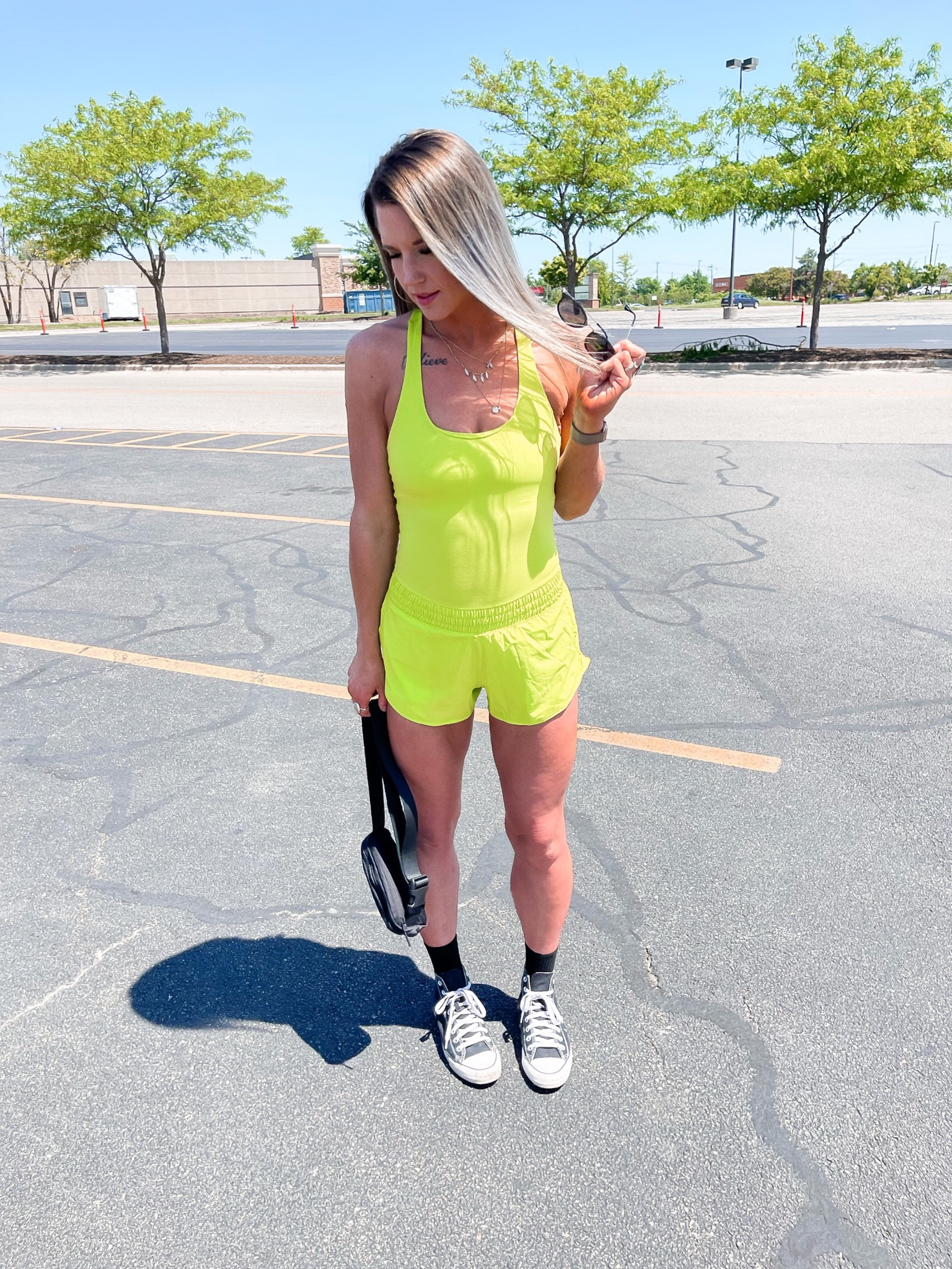 Women’s active romper style | neon style | summer outfit ideas | high top converse style | self tanner | belt bag outfit 

#aerie #activewear #outfitlook #momsonthego #rompers 

#LTKSeasonal #LTKunder50 #LTKsalealert