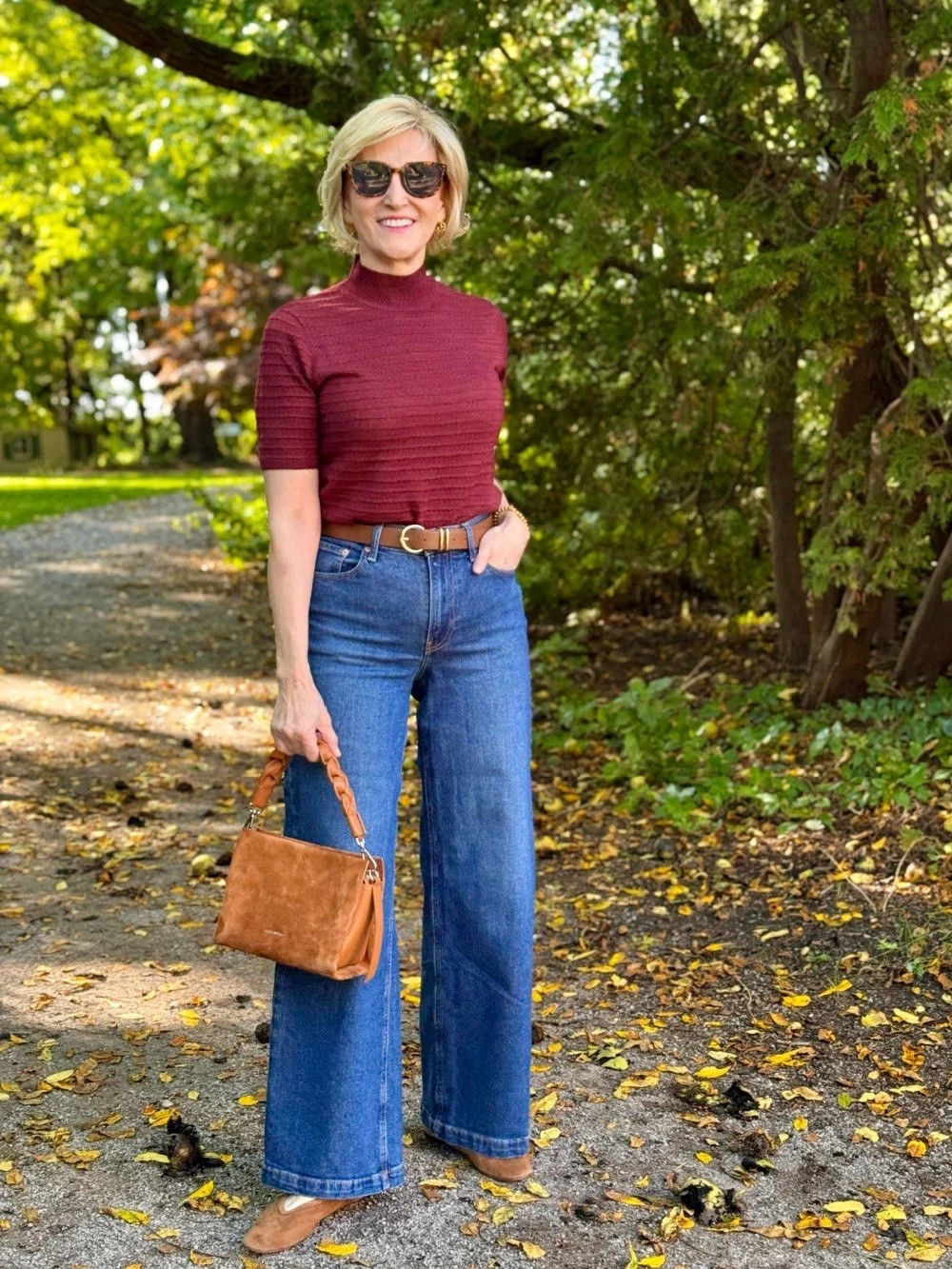 I’ve always loved an outfit that feels a little relaxed and undone, and this one really hits the mark. 🤎

I love the combination of this short-sleeve sweater with wide-leg jeans and those soft suede ballet flats. It feels casual and comfortable, but the suede and flowing denim give it just enough of that bohemian touch.

#LTKSeasonal #LTKOver40 #LTKootd