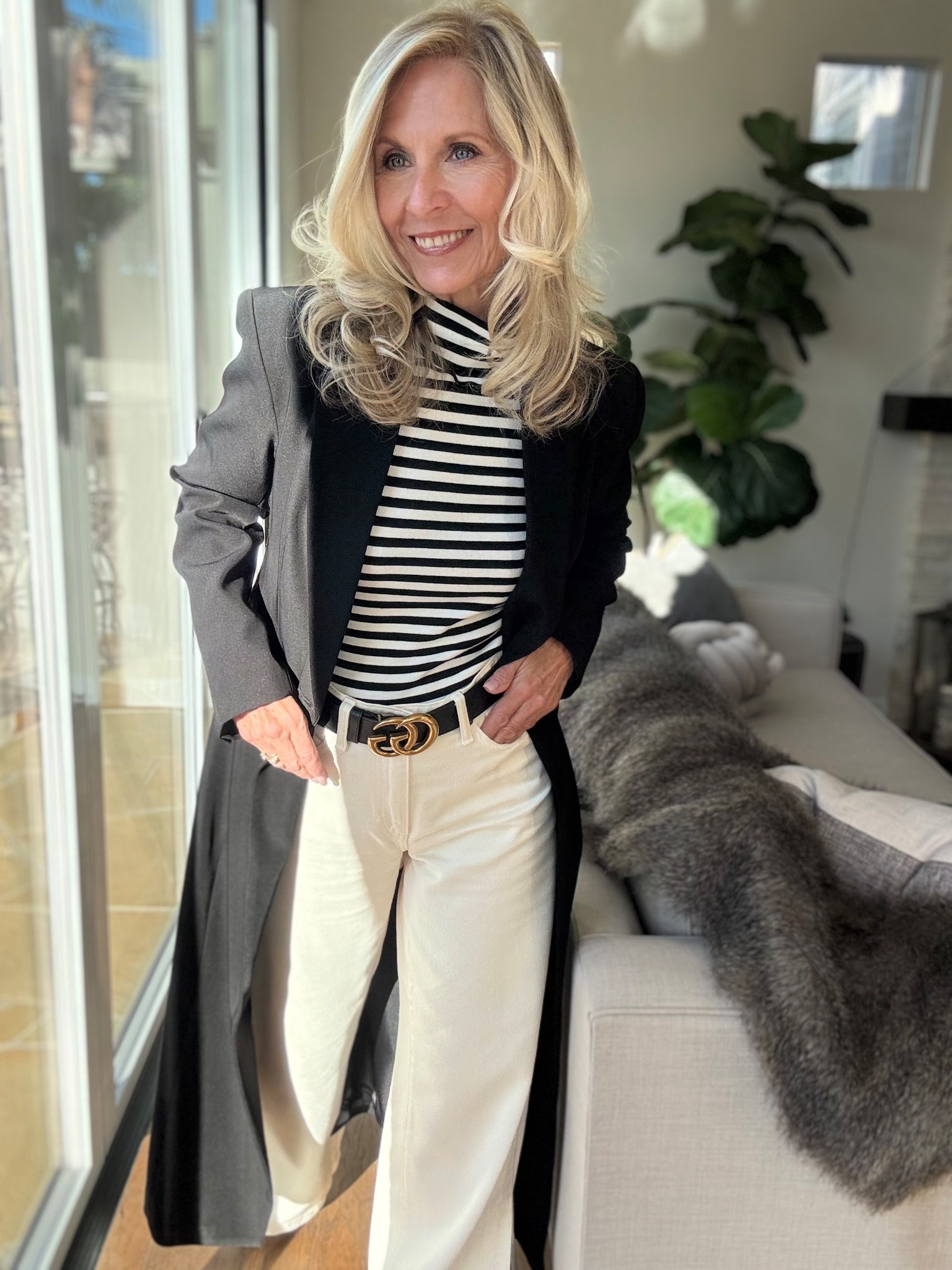 A few squares back I posted this long black blazer @commense.official with a maxi satin leopard skirt.

Same long blazer with jeans and sneakers to head out to finish off my holiday shopping.

Although I’m in California the weather is foggy and cold so this long blazer is perfect!

Are you done with your holiday shopping or still have a few more gifts to get?

Follow me for more 50+ style inspiration.

Use my code Deborahsorlie_12 for 12% off sitewide.

Follow me for more 50+ style inspiration.

#LTKHoliday #LTKOver40