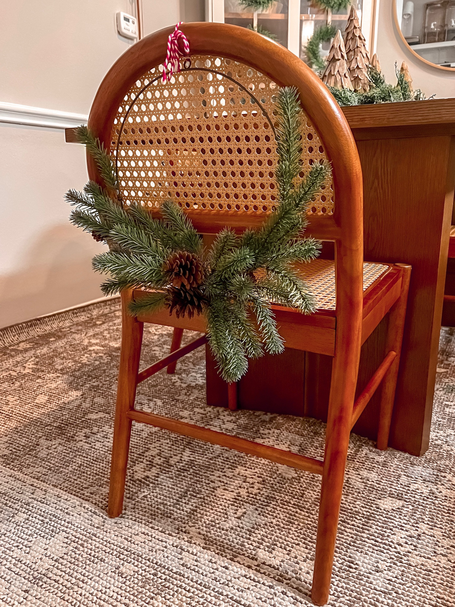 Spruced up Dining room chairs with a small wreath for the holiday Christmas season! 

#LTKCyberweek #LTKHoliday #LTKSeasonal