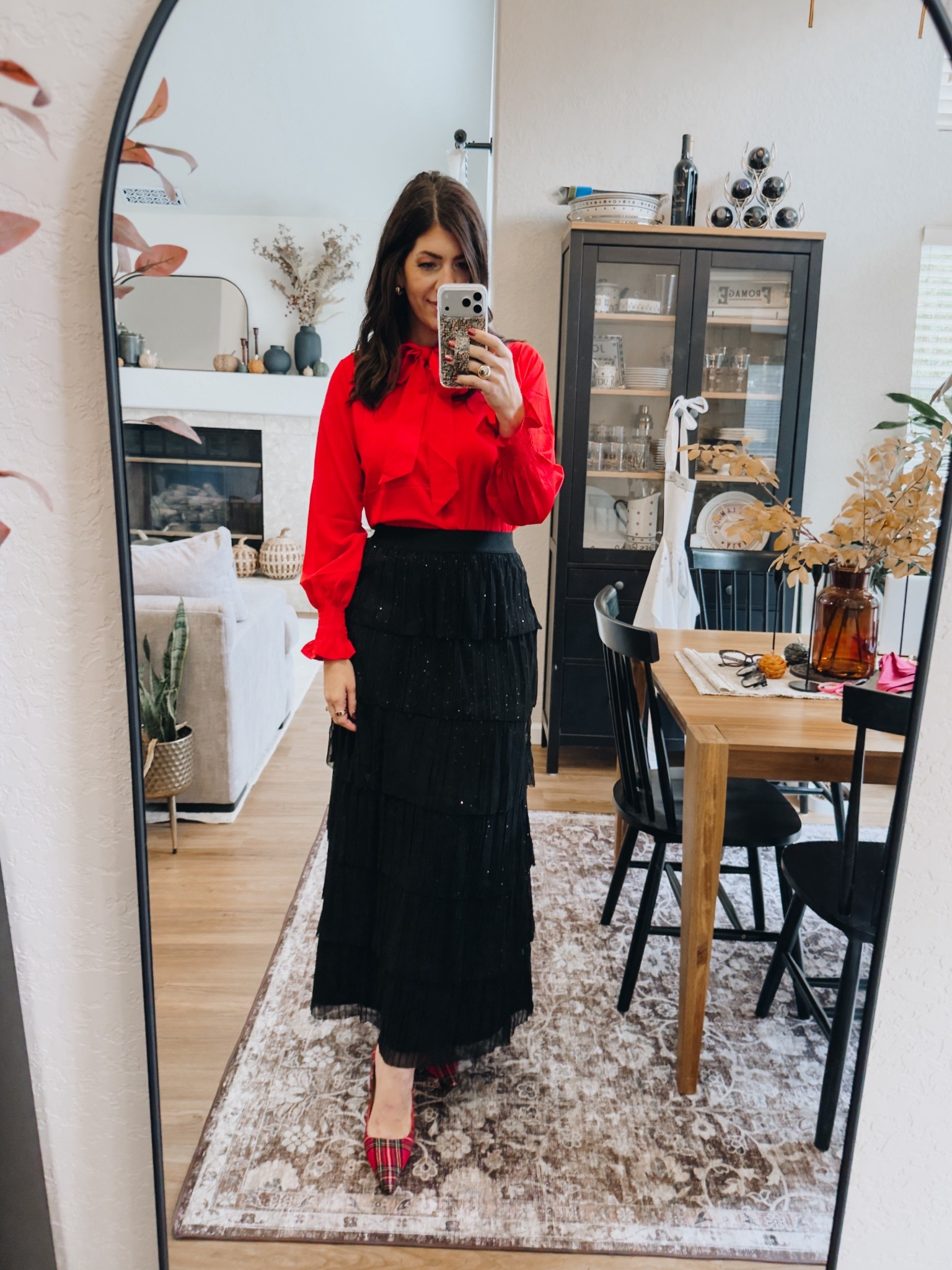 In a medium tie neck and medium tiered skirt 

#LTKHoliday #LTKSaleAlert #LTKMidsize