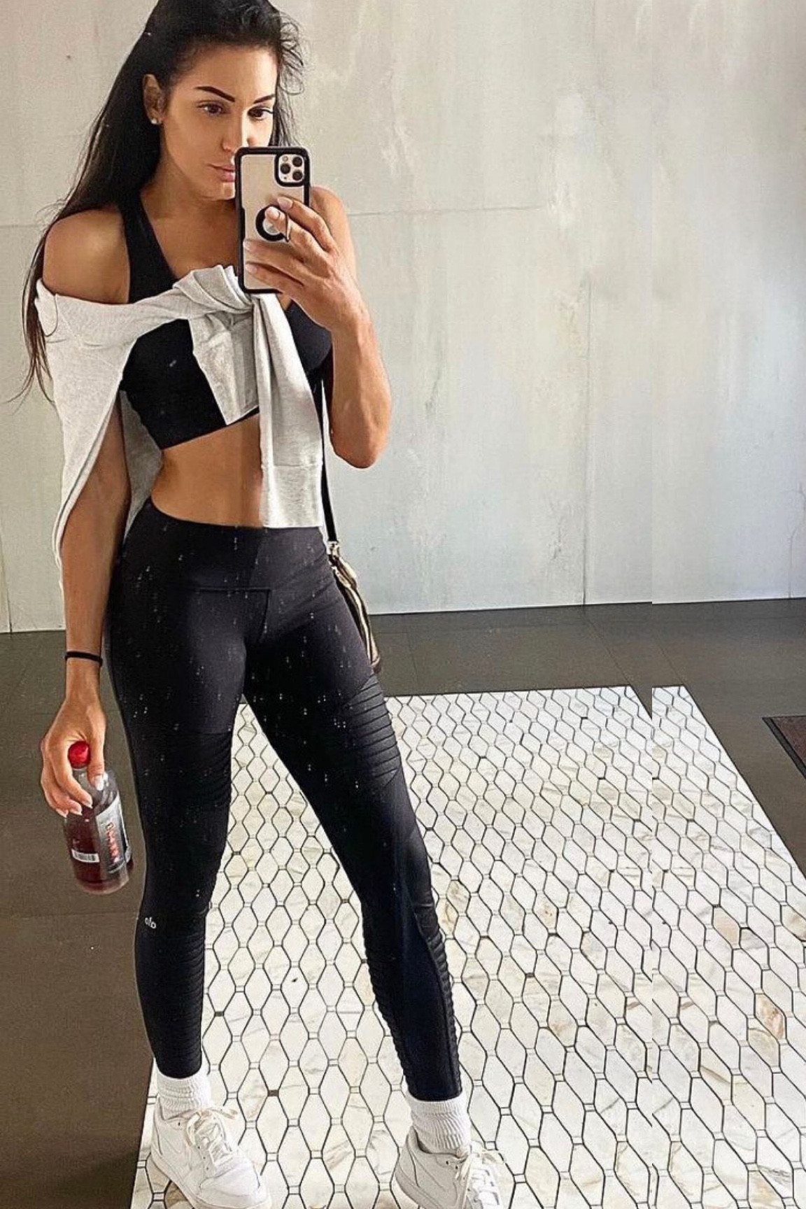 This is one of my favorite casual looks to run around and do errands. I love being in my fitness clothes because it reminds me to workout. The moto legging gives it a bit more style, and then having a light weight grey sweater over my shoulder, gives it a little punch of preppy, while covering my cleavage if I am sitting at lunch. #ltkfitness 

#LTKfit #LTKstyletip