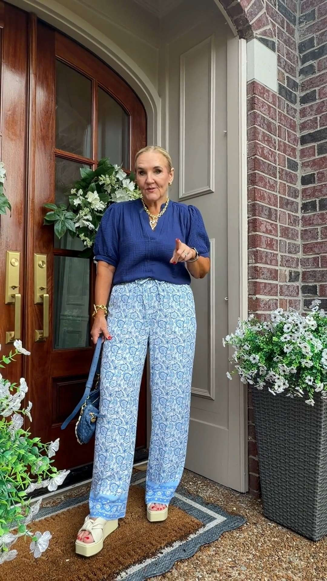 Tap the bell 🔔, heart ❤️ this post, and save for later!

If you love easy outfits that still look polished, this gauze top is one to grab. The fabric is lightweight and breathable, but the structure keeps it looking elevated instead of sloppy.

✔️ Comes in multiple colors
✔️ Easy front tuck with wide leg pants or denim
✔️ Comfortable enough for warm days without clinging

I normally wear a medium, but sized down to a small in this top. It has a relaxed fit, so sizing down gave me a cleaner look.

This is the kind of outfit that works for lunch with friends, vacation dinners, casual office days, or weekend plans when you want to look pulled together without trying too hard. 

 #LTKootd #LTKSeasonal #LTKOver40