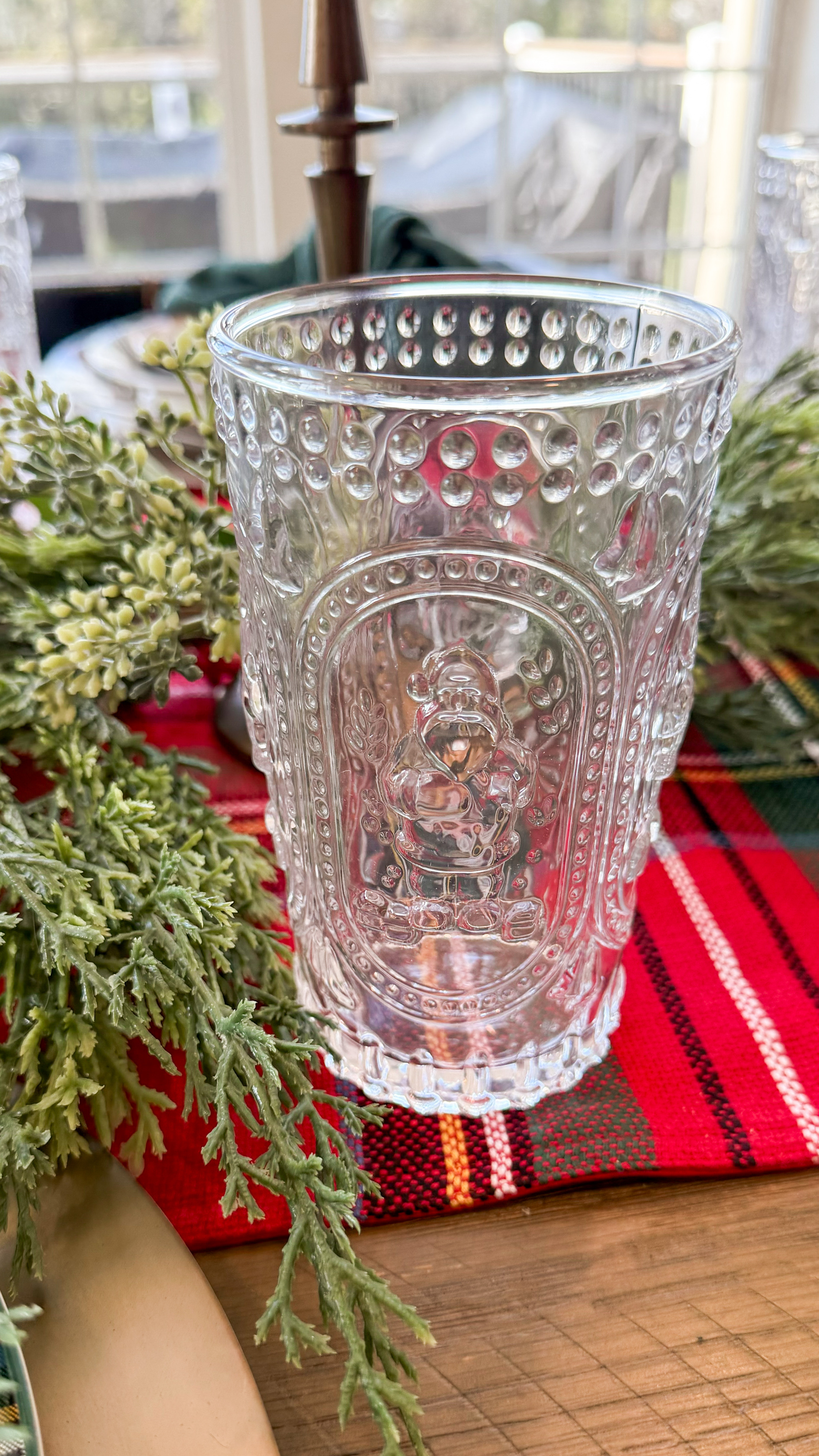 
Pottery Barn Christmas Decor Tablescape🎅🏼✨ also comes in a red glass too! 

classic christmas tablescape, christmas decor, indoor christmas decor, christmas finds, pottery barn home decor, plaid charger, santa glassware, napkin, table runner, garland, greenery, Samantha Bauchmann 

 #LTKHoliday #LTKSeasonal #LTKHome