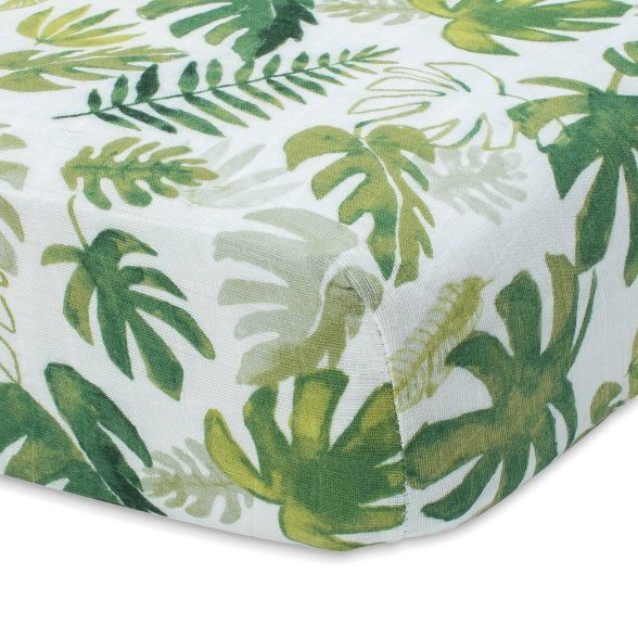 Little Unicorn Cotton Muslin Fitted Crib Sheet - Tropical Leaf | Target