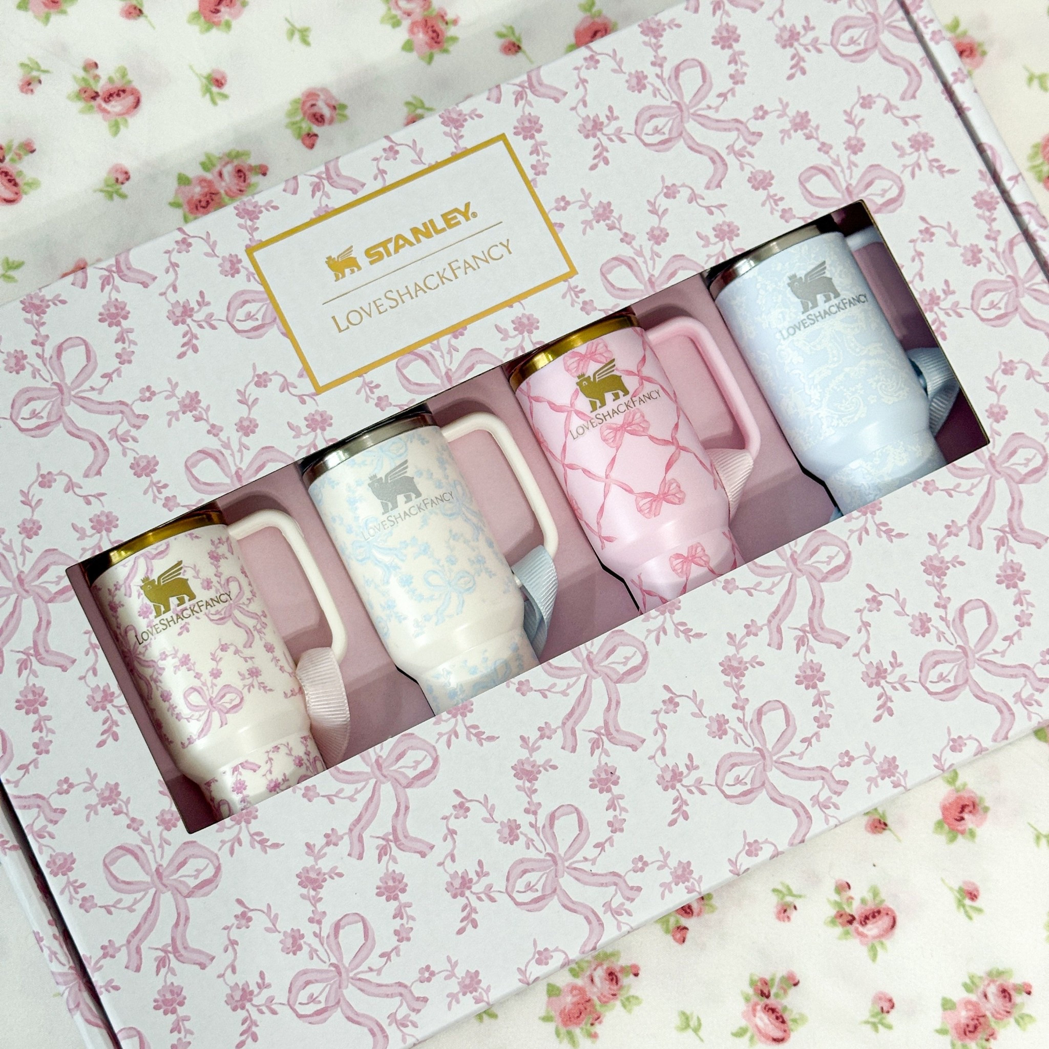 (yes they open 👀) these LoveShackFancy x Stanley Christmas ornaments were too cute to pass up - they’d be perfect as a keychain/bag charm! I know you could definitely fit a lip balm inside, I’m trying to think of what else we could do 🤔🎀

#LTKHoliday #LTKCyberWeek #LTKGiftGuide