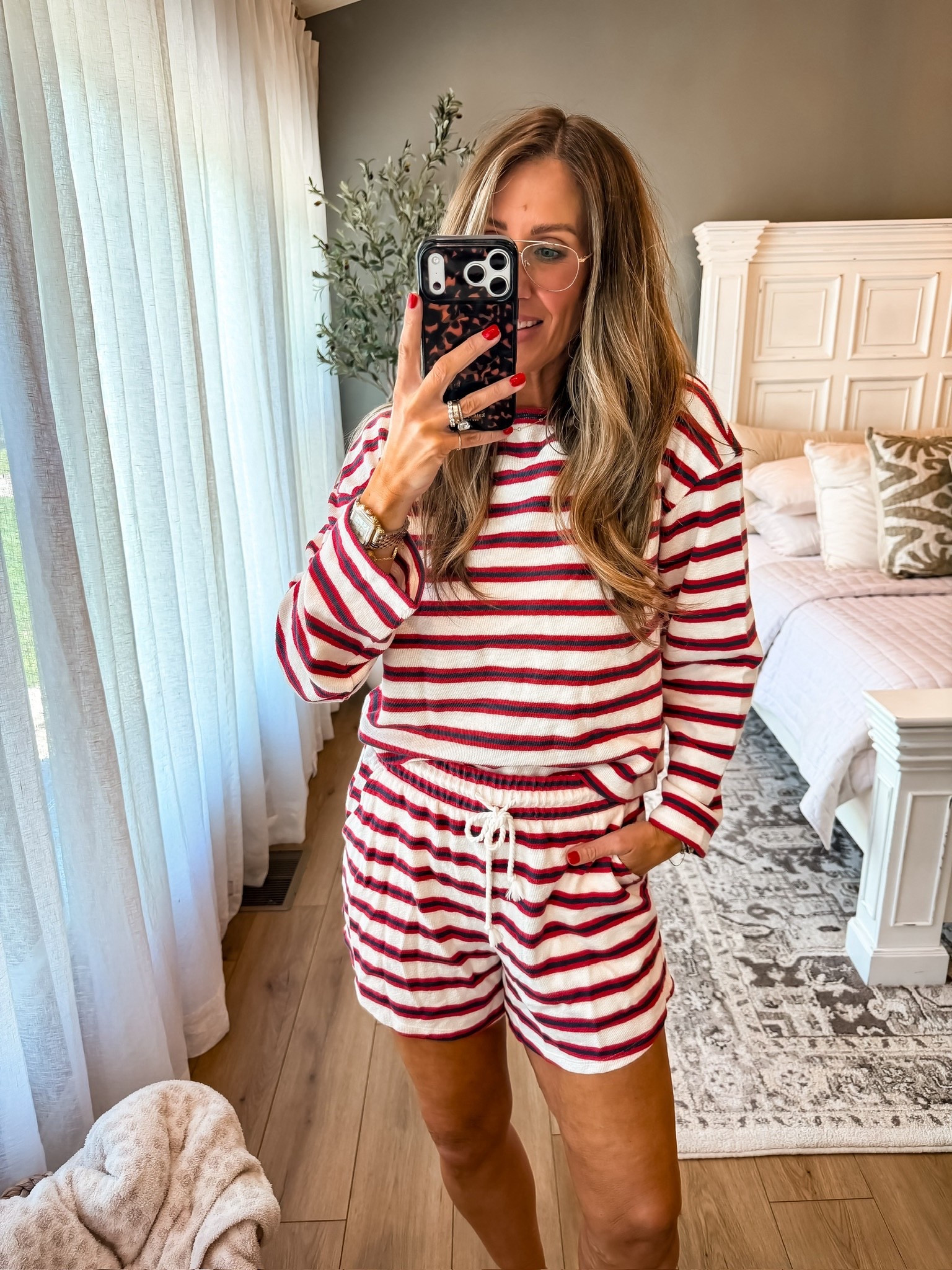 This set is too good for lounging only. The soft fabric + the relaxed fit makes it so comfy, but the stripes keep it feeling cute and put together. Perfect for slow mornings, travel days, or just running around while still looking pulled together

matching lounge set, striped outfit, casual comfy style, travel outfit, everyday look, themominstyle 

#LTKootd #LTKTravel #LTKSeasonal