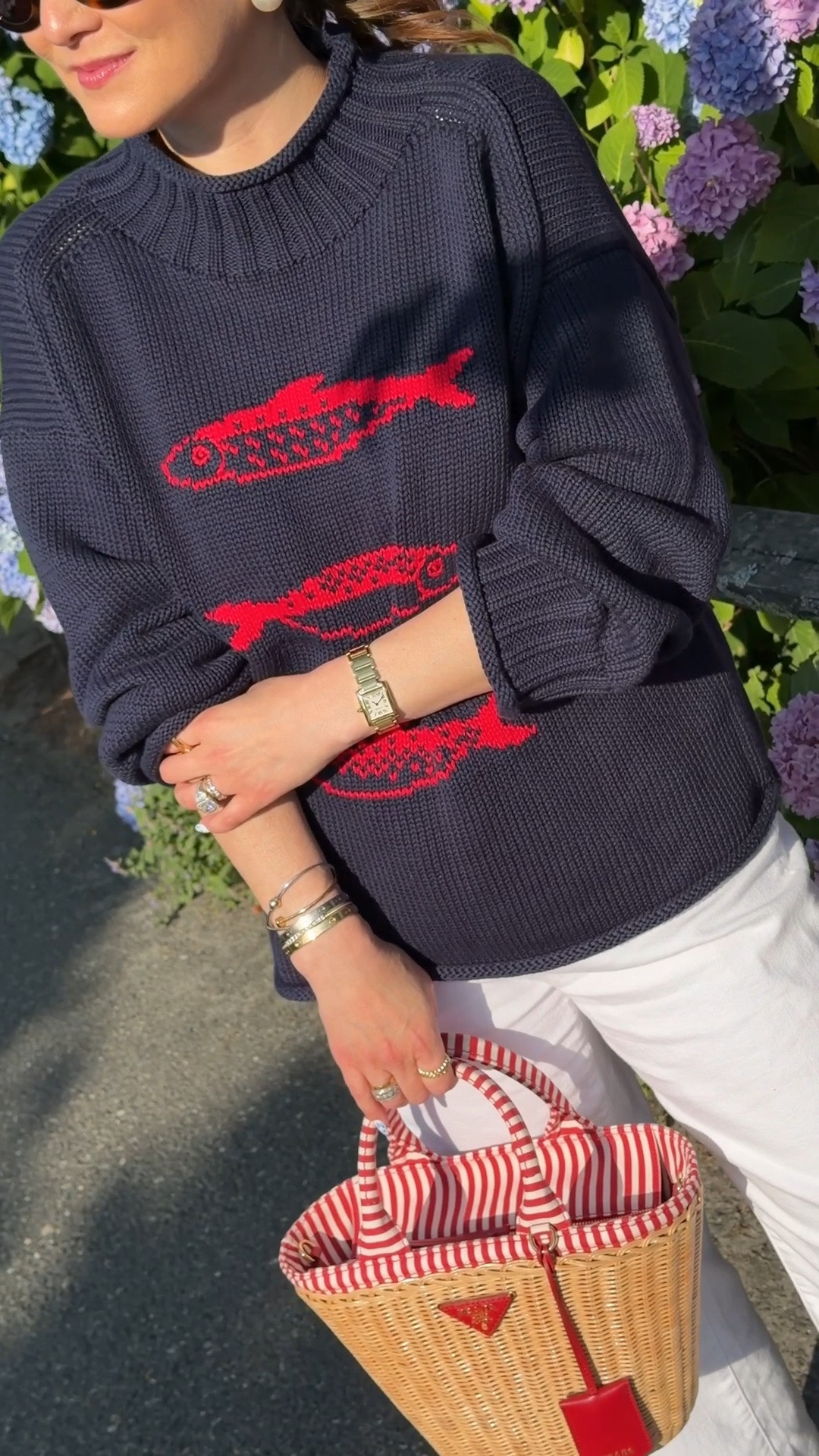 A casual coastal look for lunch on Nantucket featuring this navy and red sardine rollneck sweater, Prada wicker bag, and wide leg white denim

#LTKgrwm #LTKootd #LTKSaleAlert
