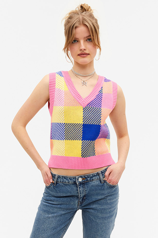 Pink striped V-neck knit vest
                  			
				£28 | Monki