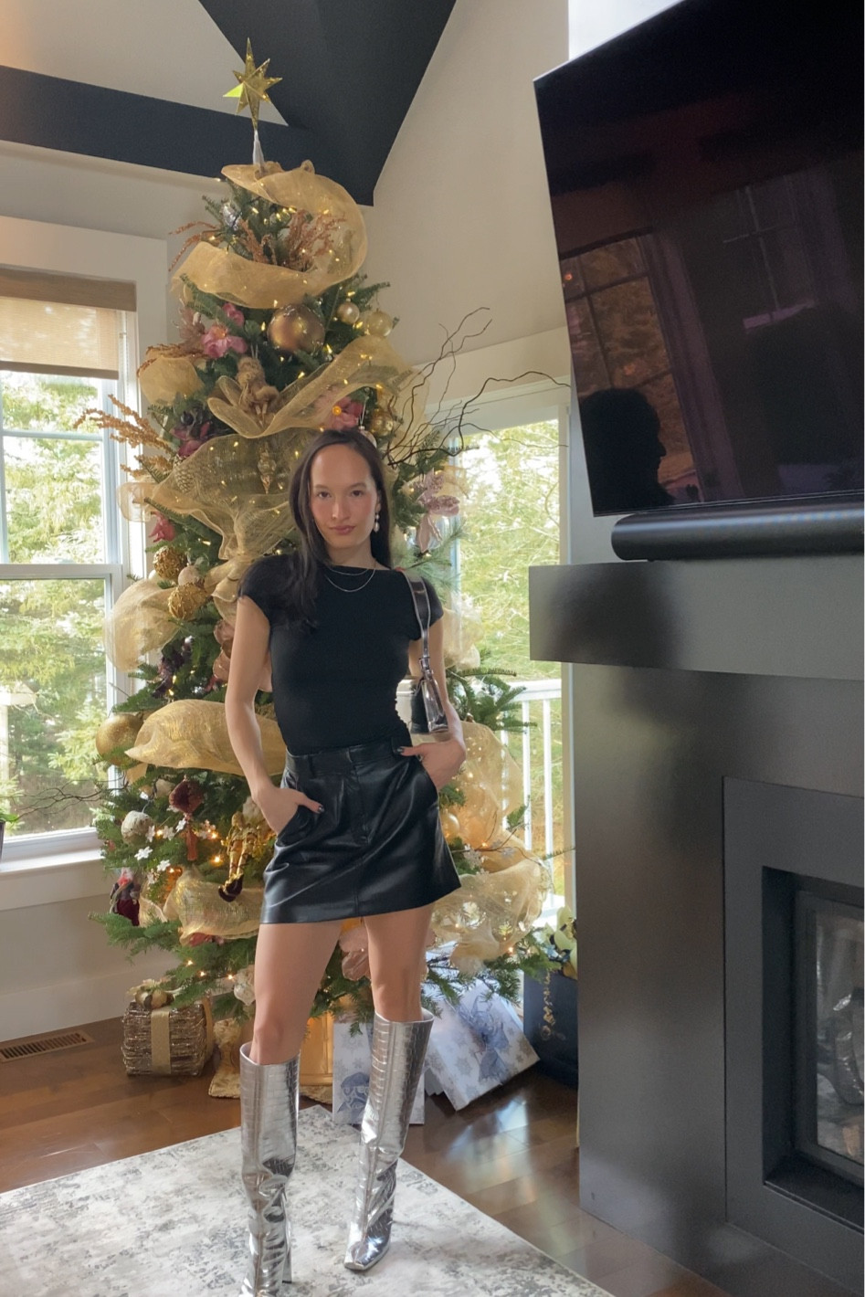 Going out — holiday outfit inspo 
Silver metallic boots, backless amazon top, aritzia vegan leather skirt, silver trend bag

#LTKSeasonal #LTKHoliday #LTKstyletip