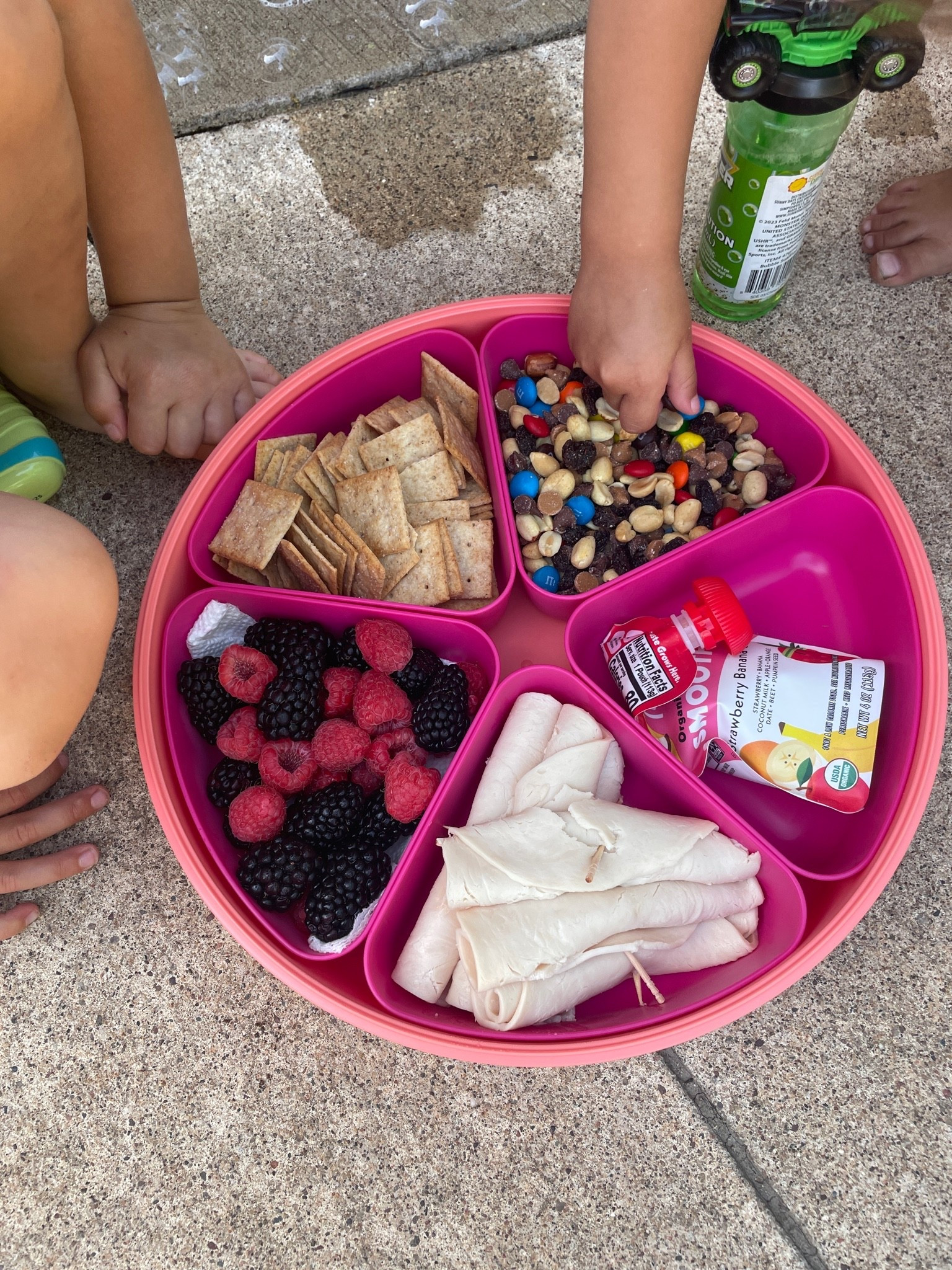 This snackle box can be packed for road trips, pool days, and busy afternoons.

#LTKmomlife #LTKTravel