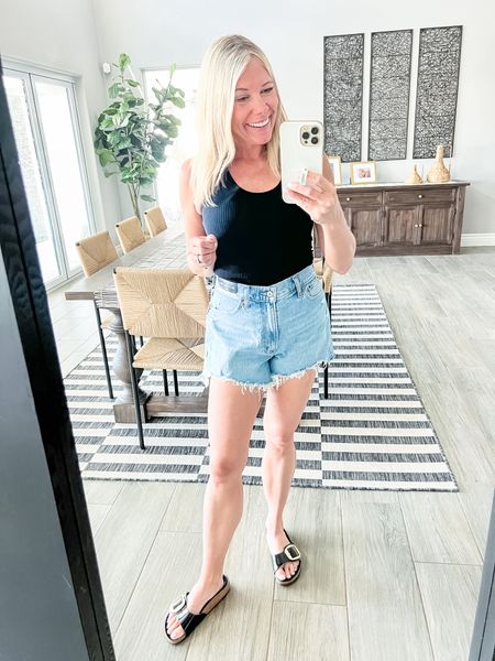 Love these jean shorts with a black tank and sandals. 26 curve love shorts and small tank. 38 sandals. Spring outfit ideas 

#LTKSeasonal #LTKover40 #LTKstyletip