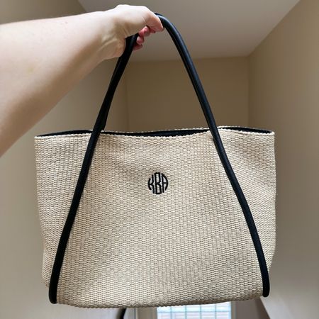 Over 50% off! Cute beach bag or spring break tote bag, leather straps make it a little dressier and the woven raffia is beautiful. 

#LTKSeasonal #LTKsalealert #LTKitbag
