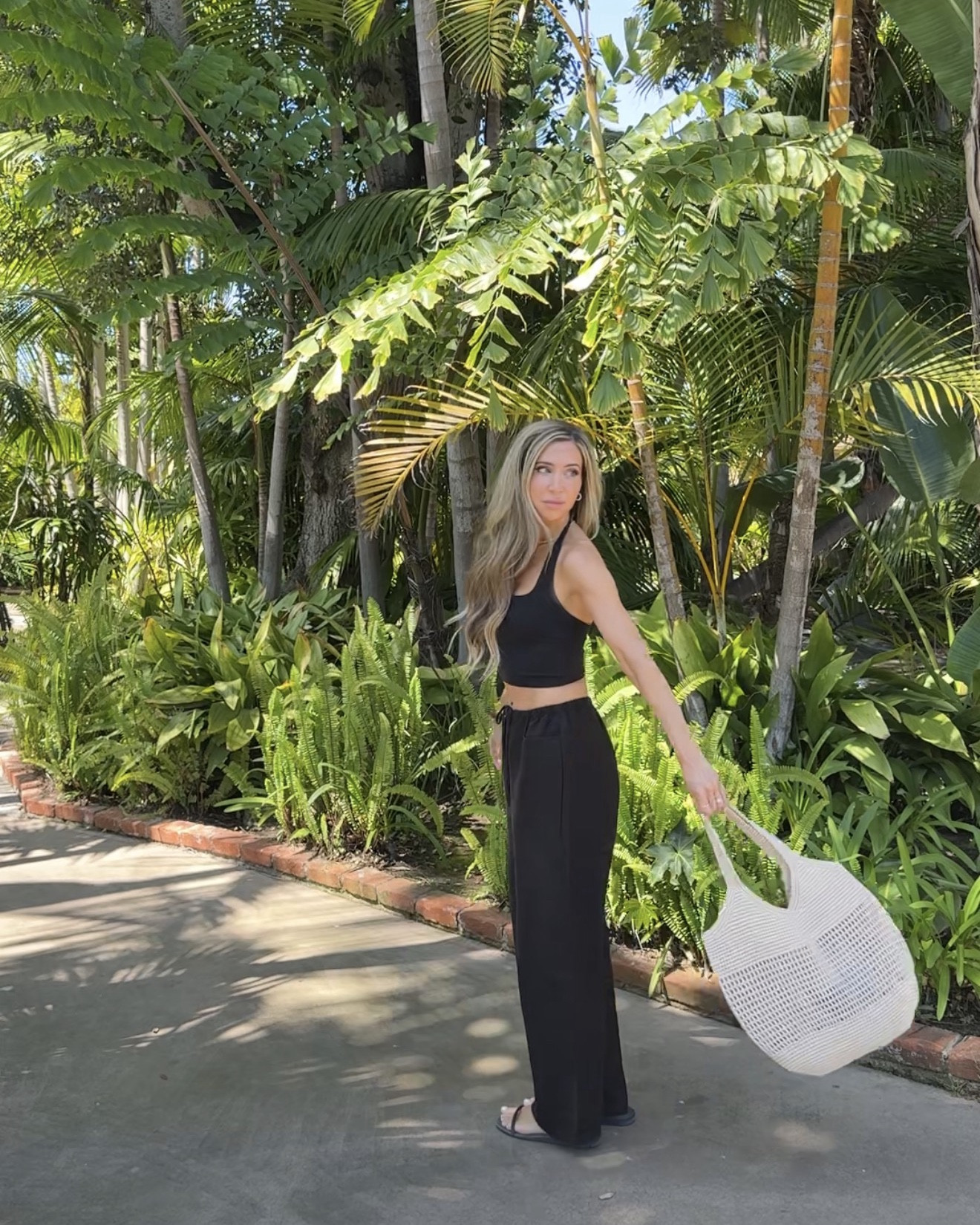 Easy resort wear 10/10 ⭐️ These pants from Aritzia were the perfect choice for a sunny 72 degree day. So breezy & light weight! Wearing an xs. Also these Crocs sandals 🙌🏻

#LTKdayinmylife #LTKPetite #LTKmomlife