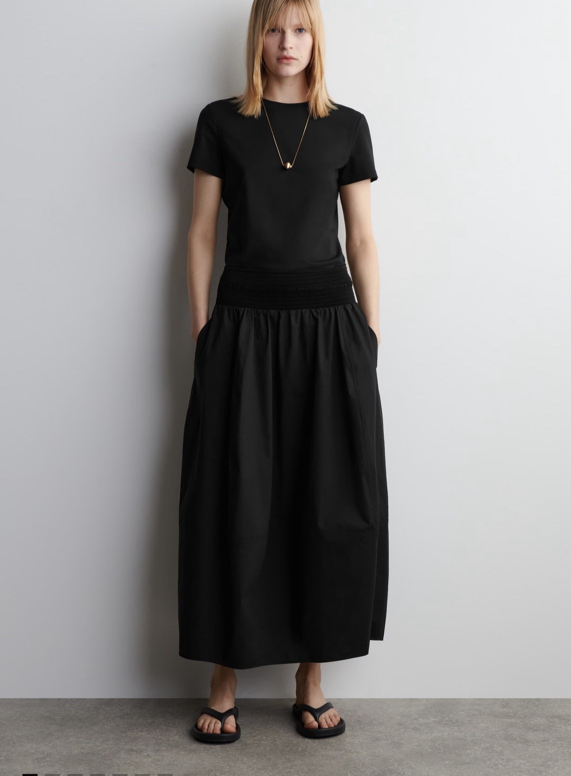 SMOCKED PANELED MIDI SKIRT

Channelling a modern elegance, this midi skirt is crafted from soft cotton and designed with a smocked waistband and a paneled, tulip-shaped skirt that moves with subtle volume. Style it with barely-there sandals and a bandeau for an effortlessly refined look.

#LTKWorkwear #LTKStyleTip #LTKParties