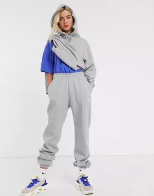 Nike mini swoosh oversized sweatpants in gray | ASOS (Global)