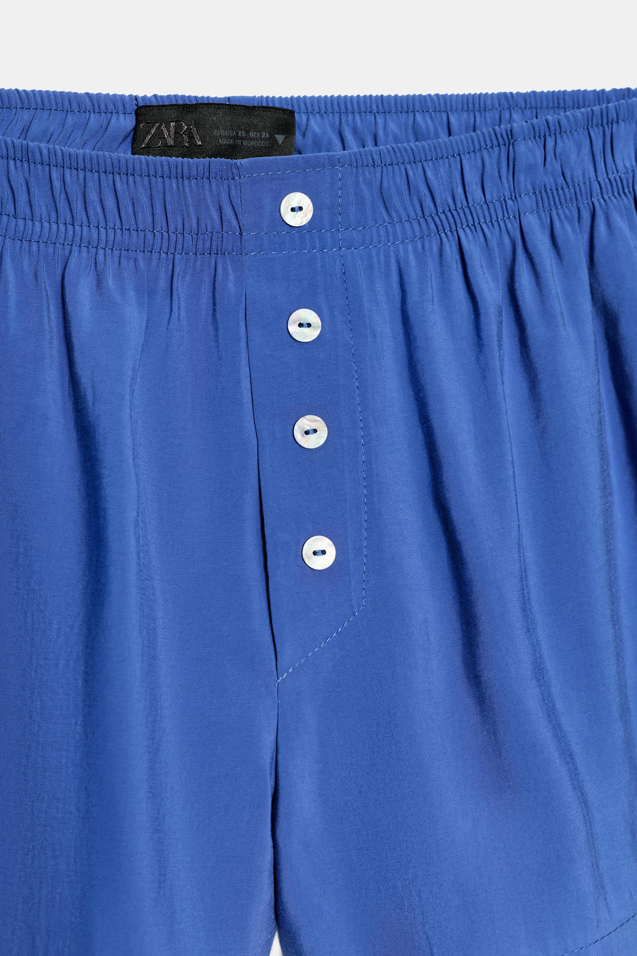 FLOWY SHORTS WITH ELASTIC WAIST AND BUTTONS | Zara US