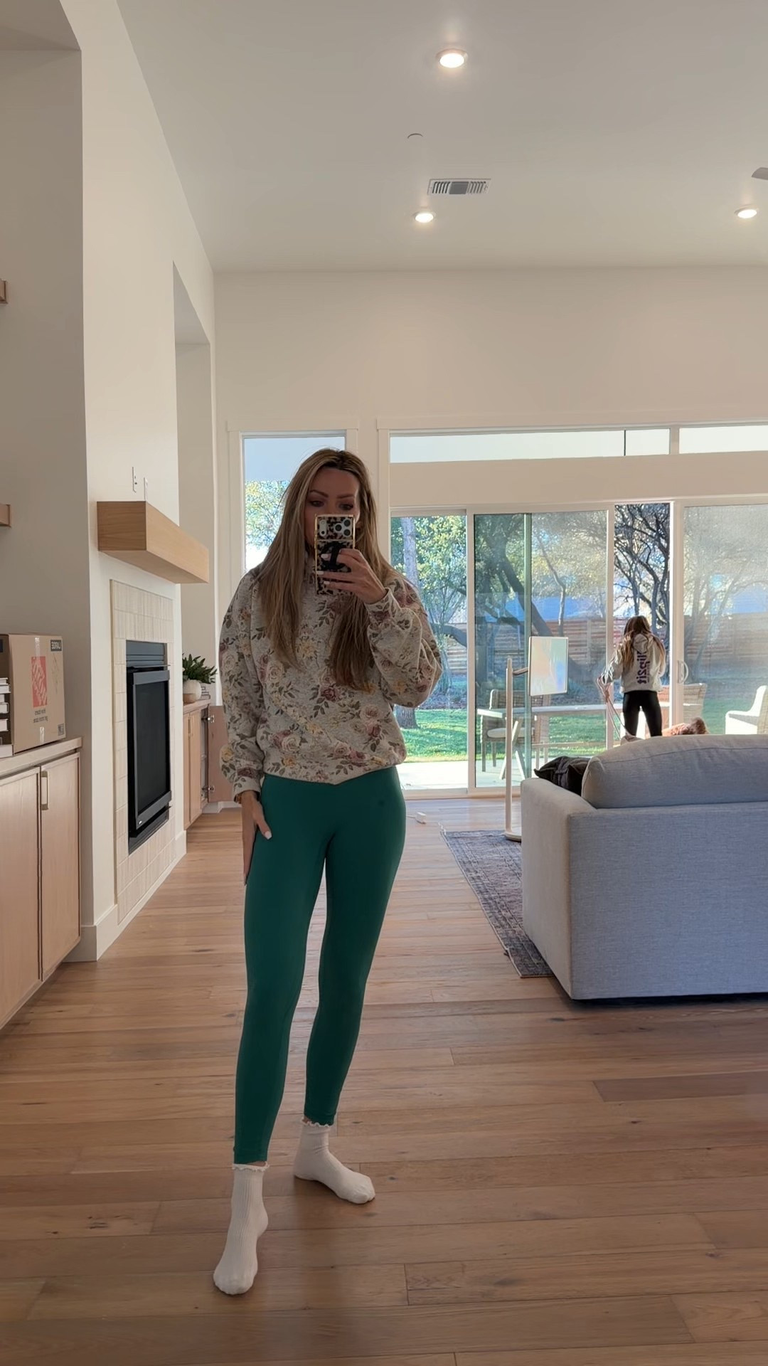 Moving OOTD loving this floral sweatshirt and my Lulu look for less leggings from Amazon wearing size small in both.